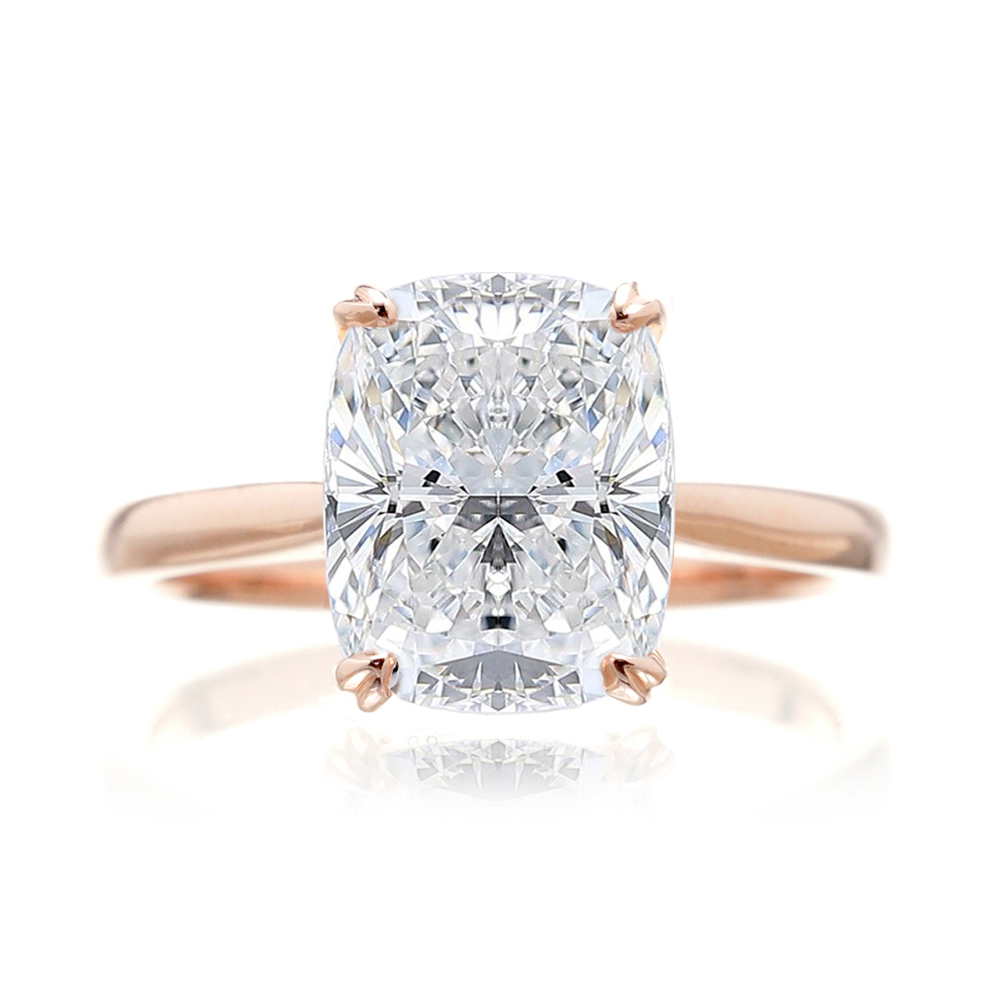 Cushion diamond solitaire engagement ring with solid band in rose gold