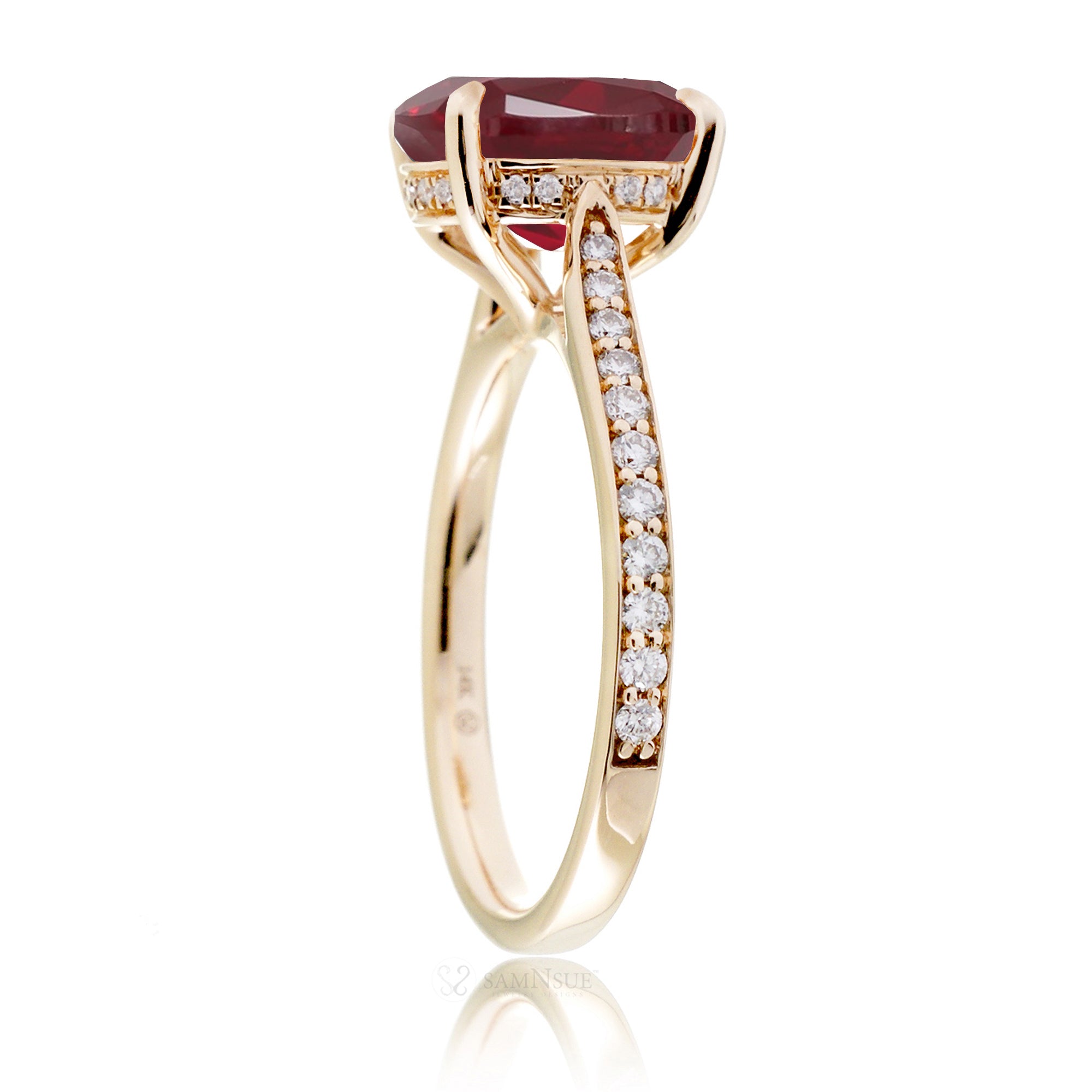 Cushion ruby diamond band and hidden halo engagement ring in yellow gold