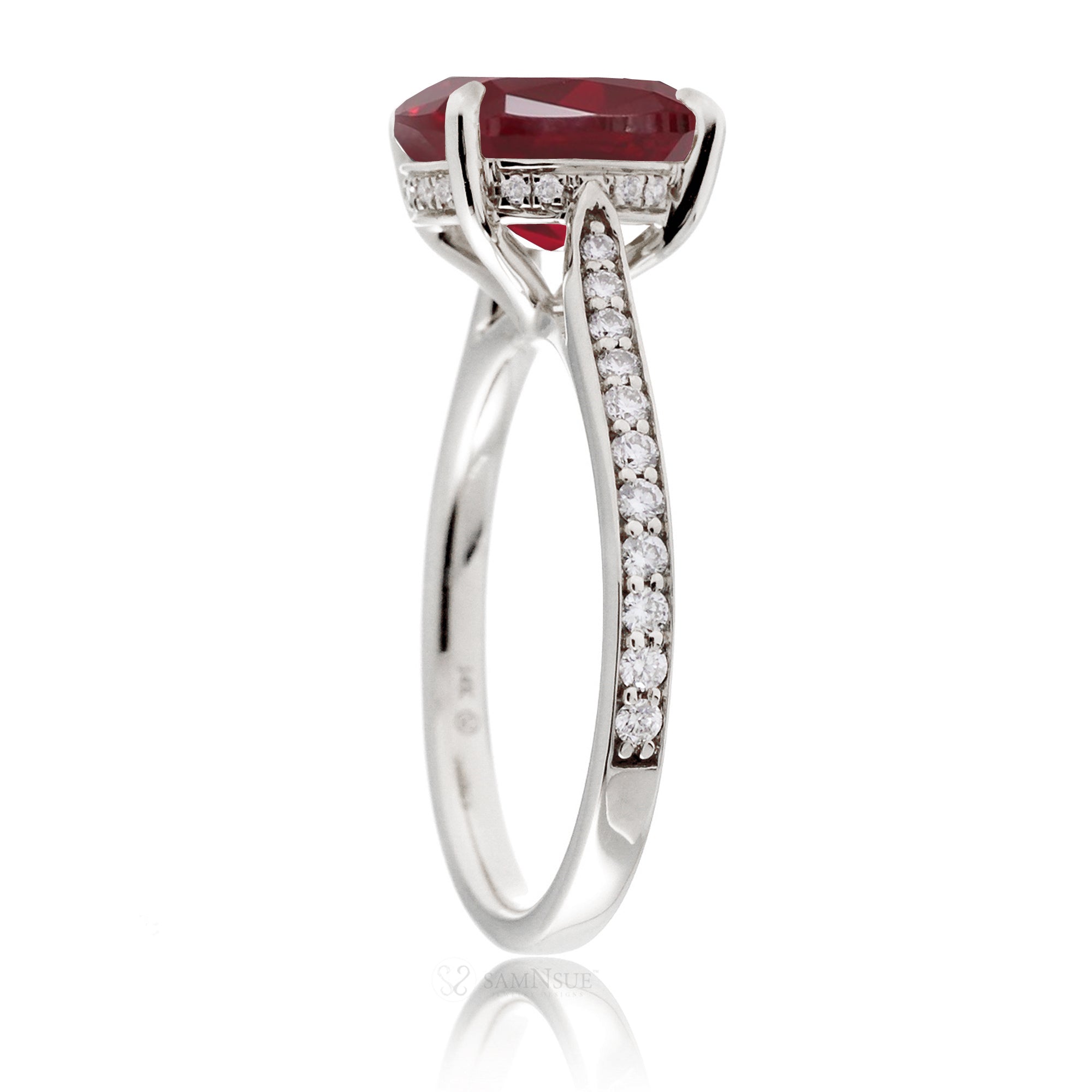 Cushion ruby diamond band and hidden halo engagement ring in white gold