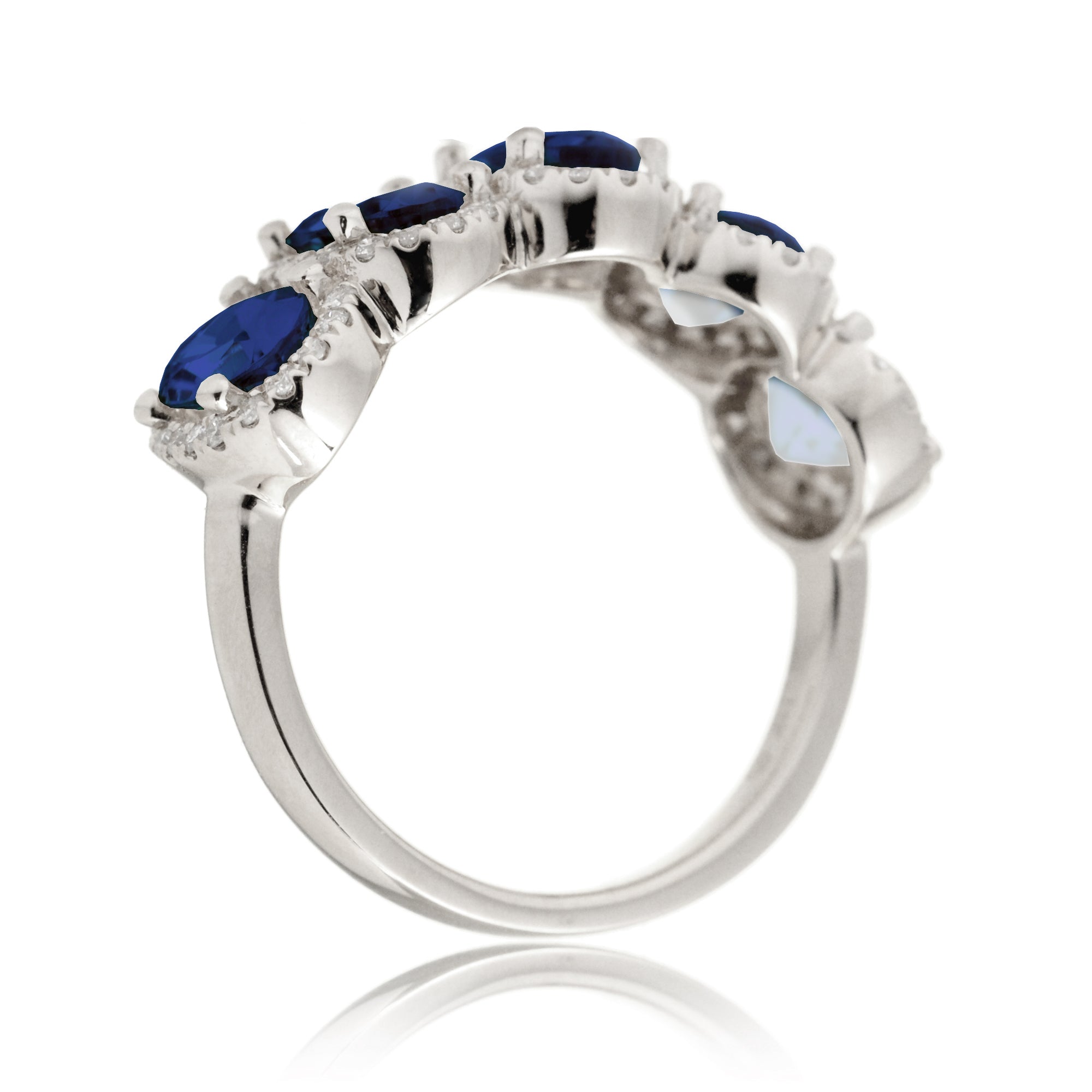 Five stone anniversary band with blue oval sapphire and diamond halo white gold wedding band