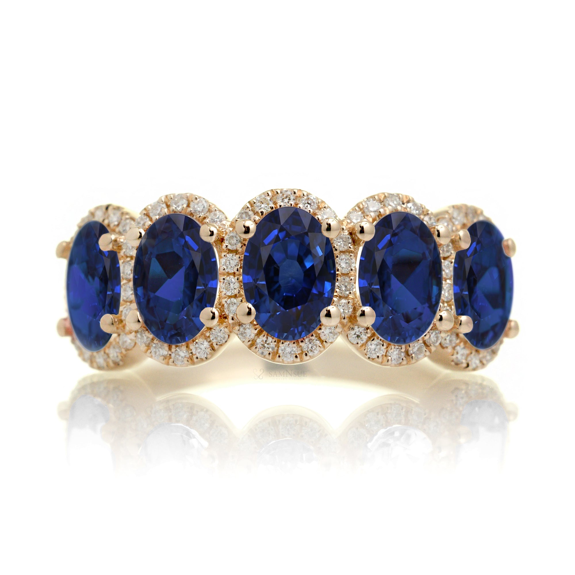 Five stone anniversary band with blue oval sapphire and diamond halo yellow gold wedding band