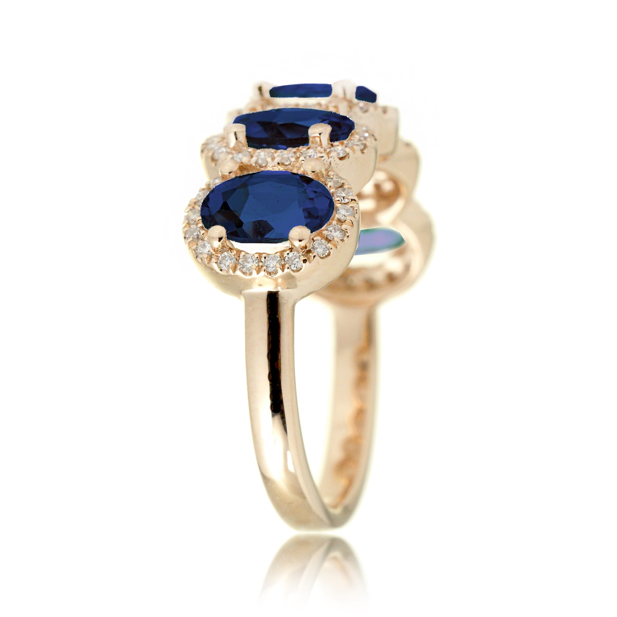Five stone anniversary band with blue oval sapphire and diamond halo yellow gold wedding band