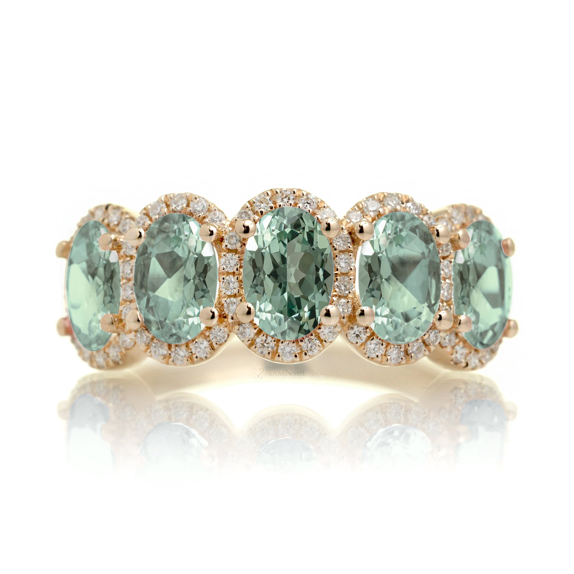 Five stone green sapphire wedding anniversary band with diamond halo in yellow gold
