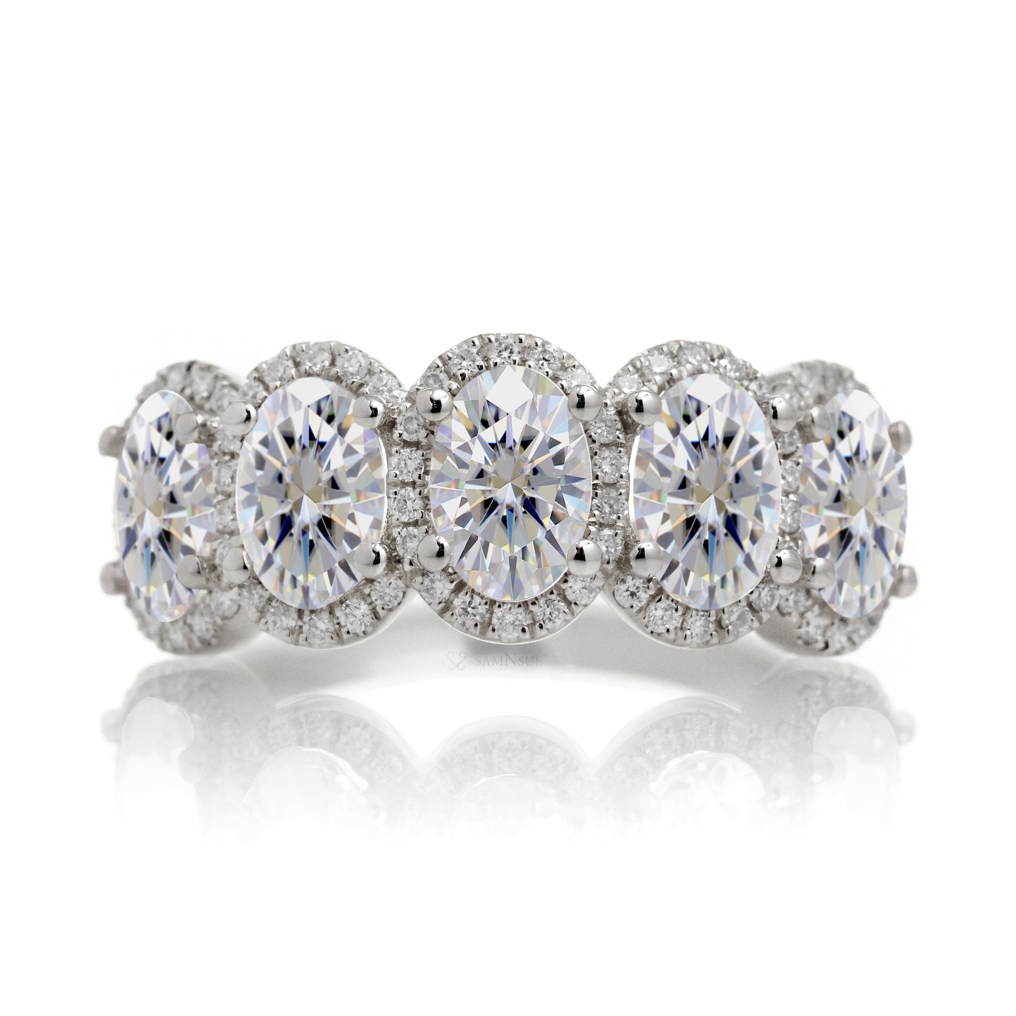 Moissanite anniversary wedding band with moissanite and diamonds in white gold