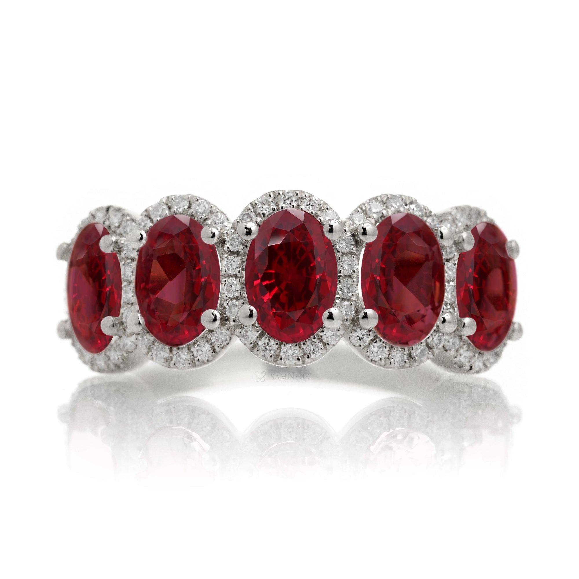 Five stone ruby anniversary band with diamond halo in white gold