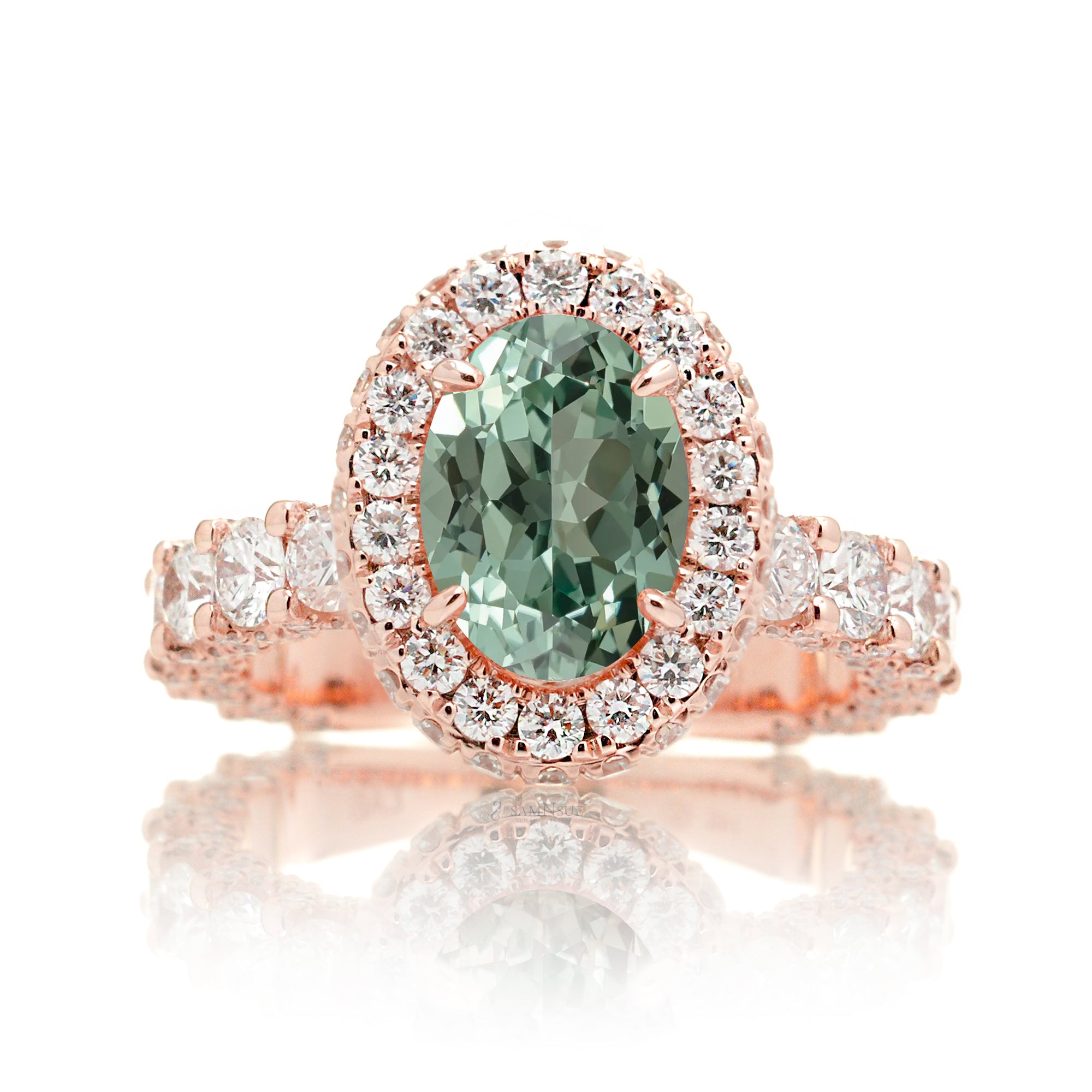 Oval green sapphire diamond engagement ring with halo