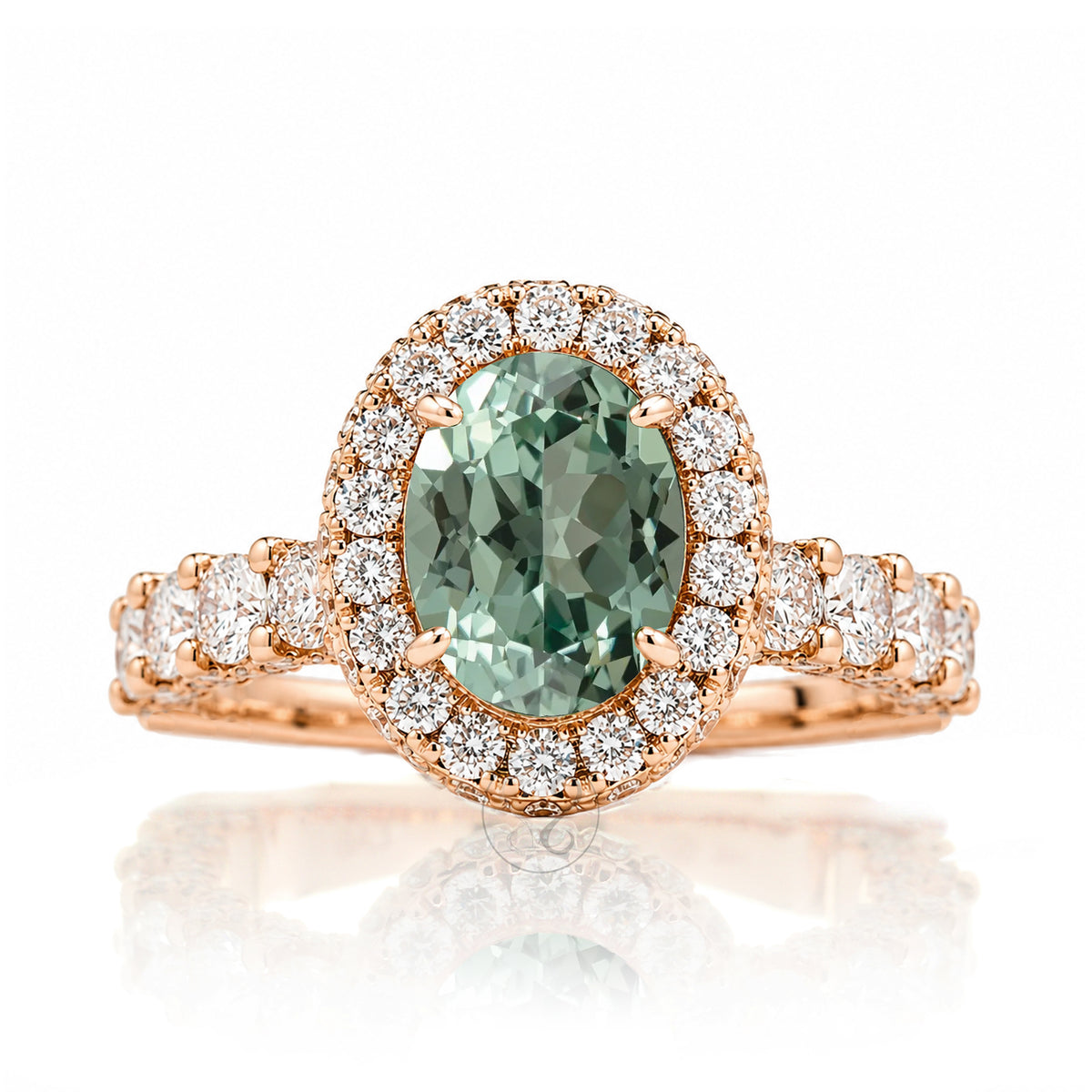 Oval green sapphire diamond engagement ring with halo