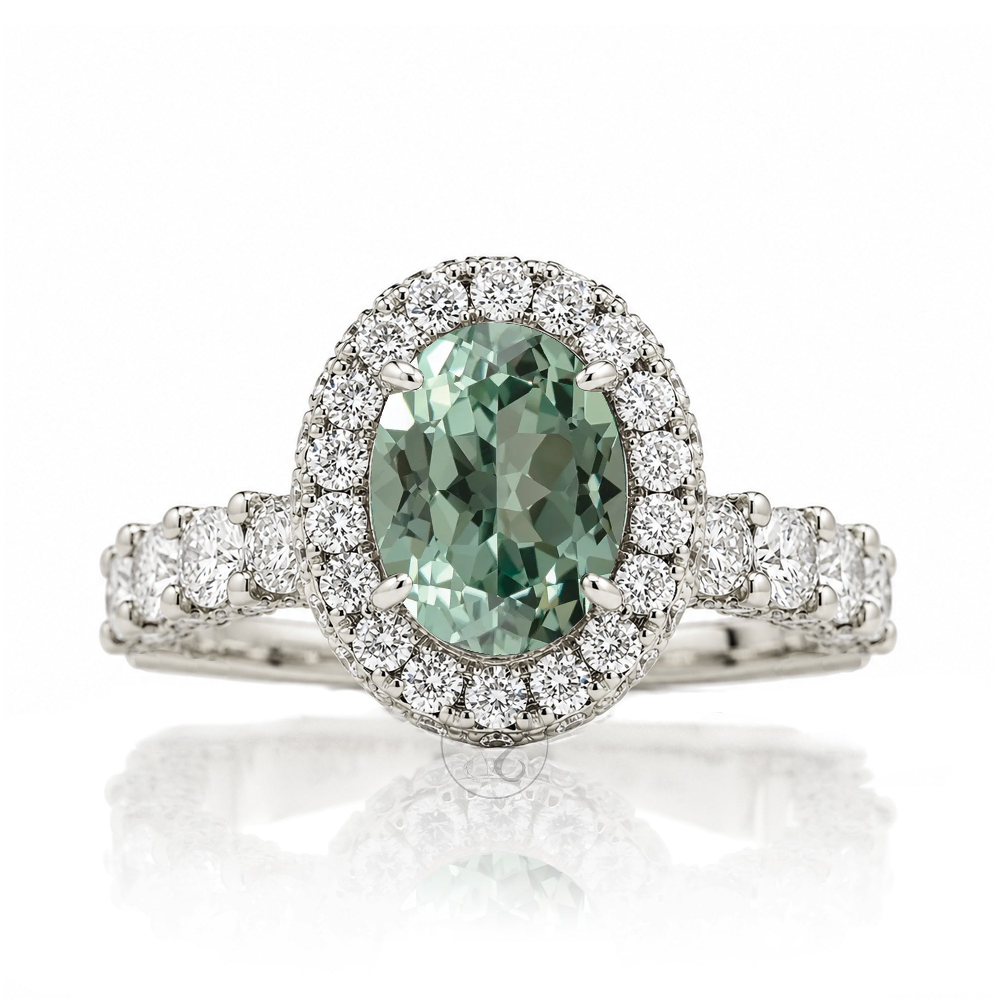 Oval green sapphire diamond engagement ring with halo