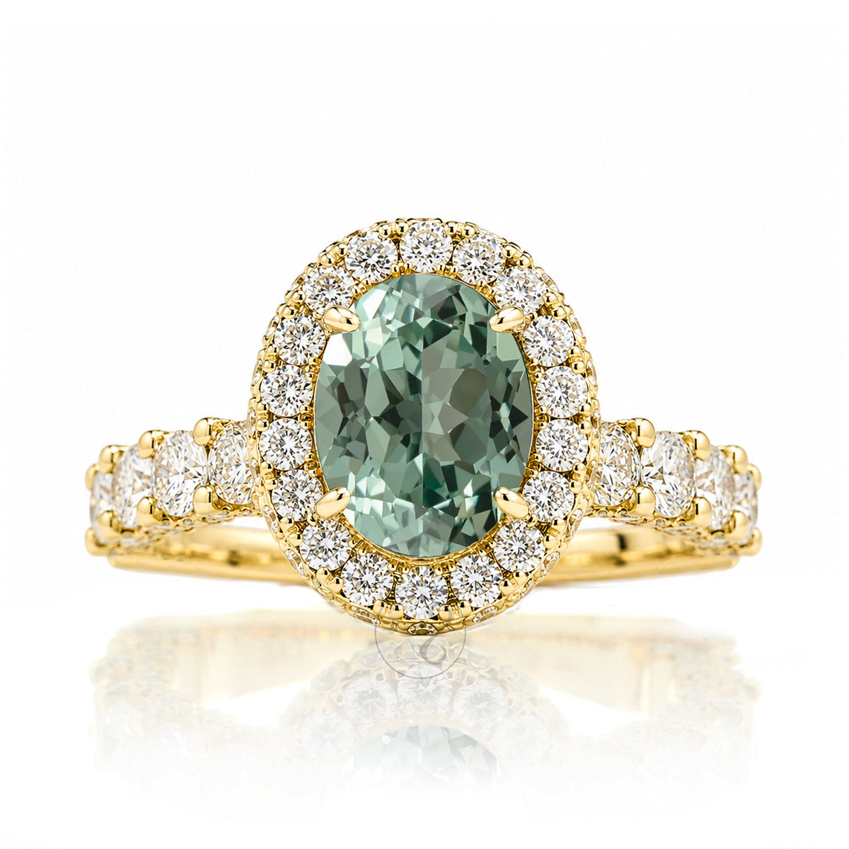 Oval green sapphire diamond engagement ring with halo