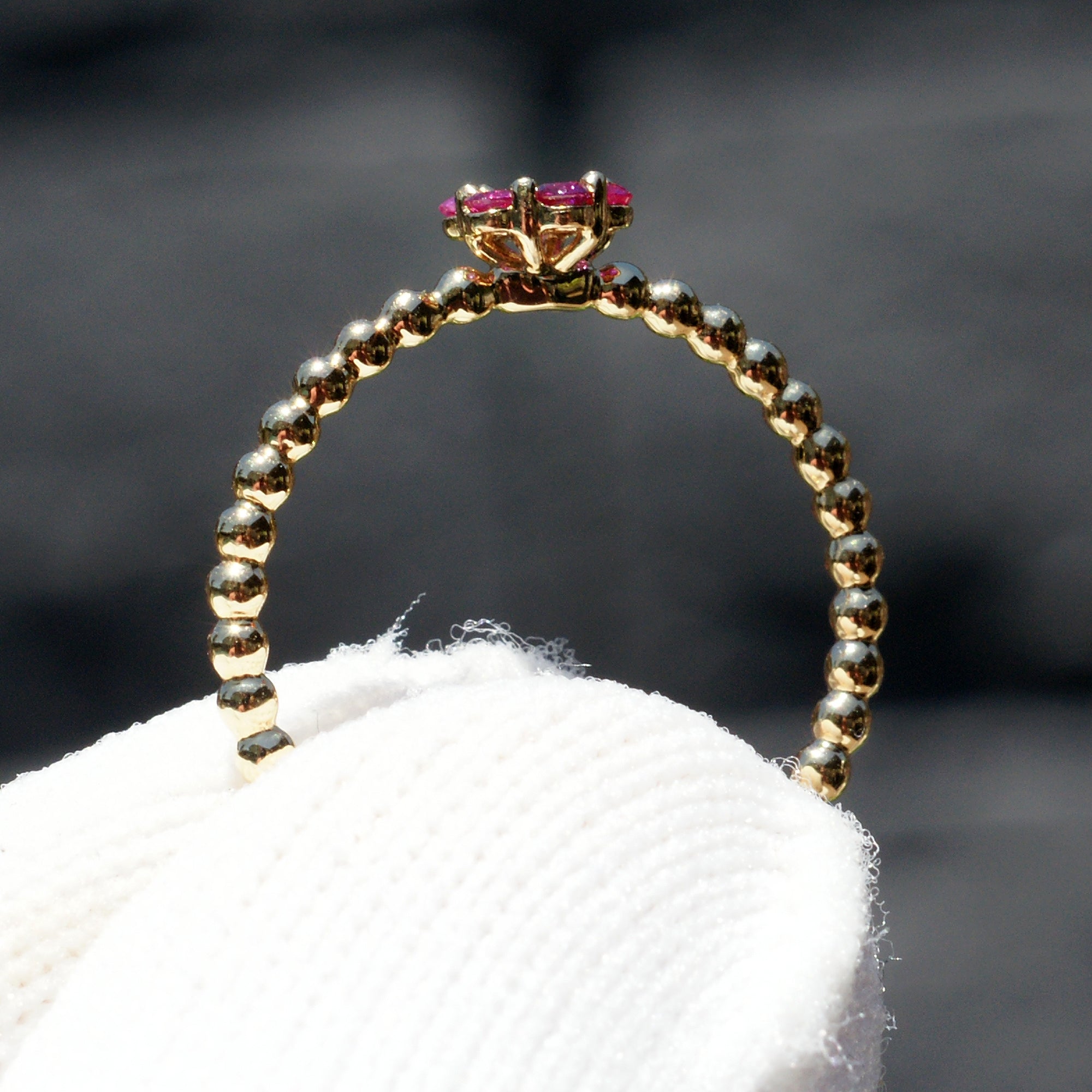 Flower ruby and diamond ring with beaded yellow gold band