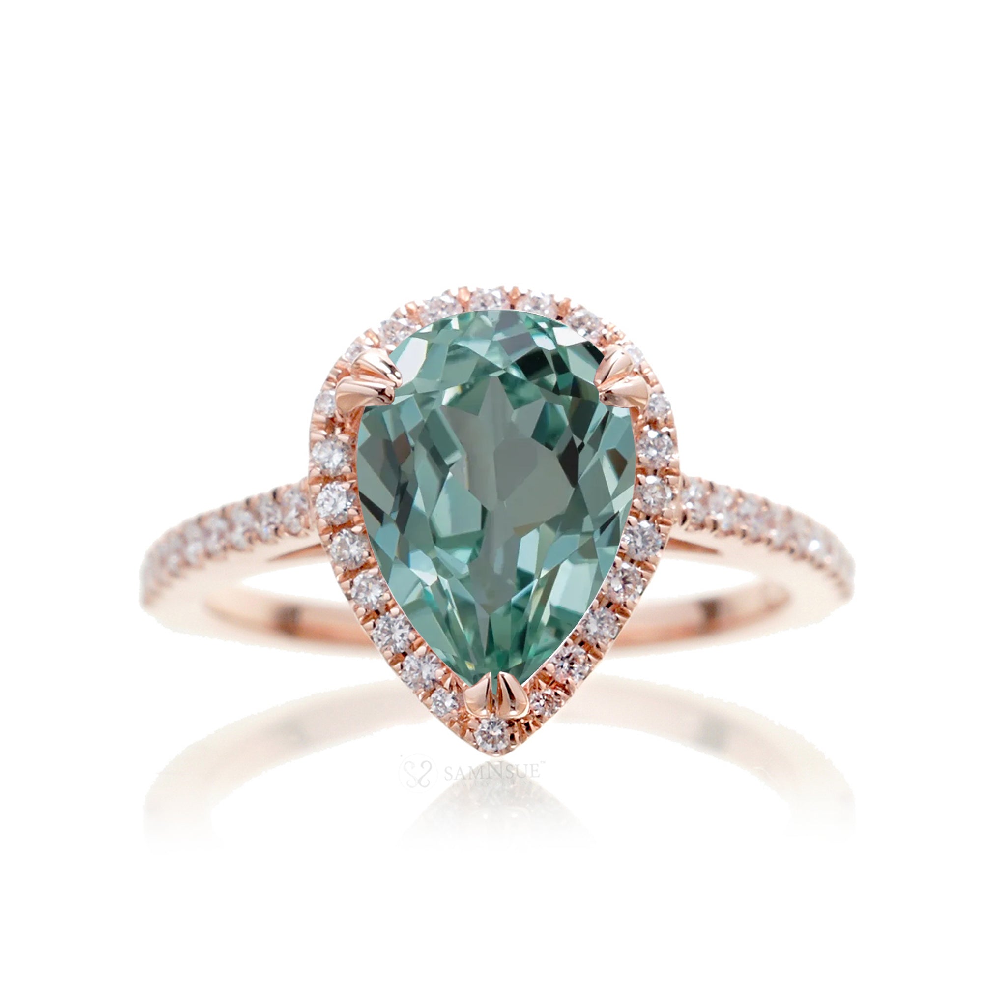 Pear shape green sapphire engagement ring