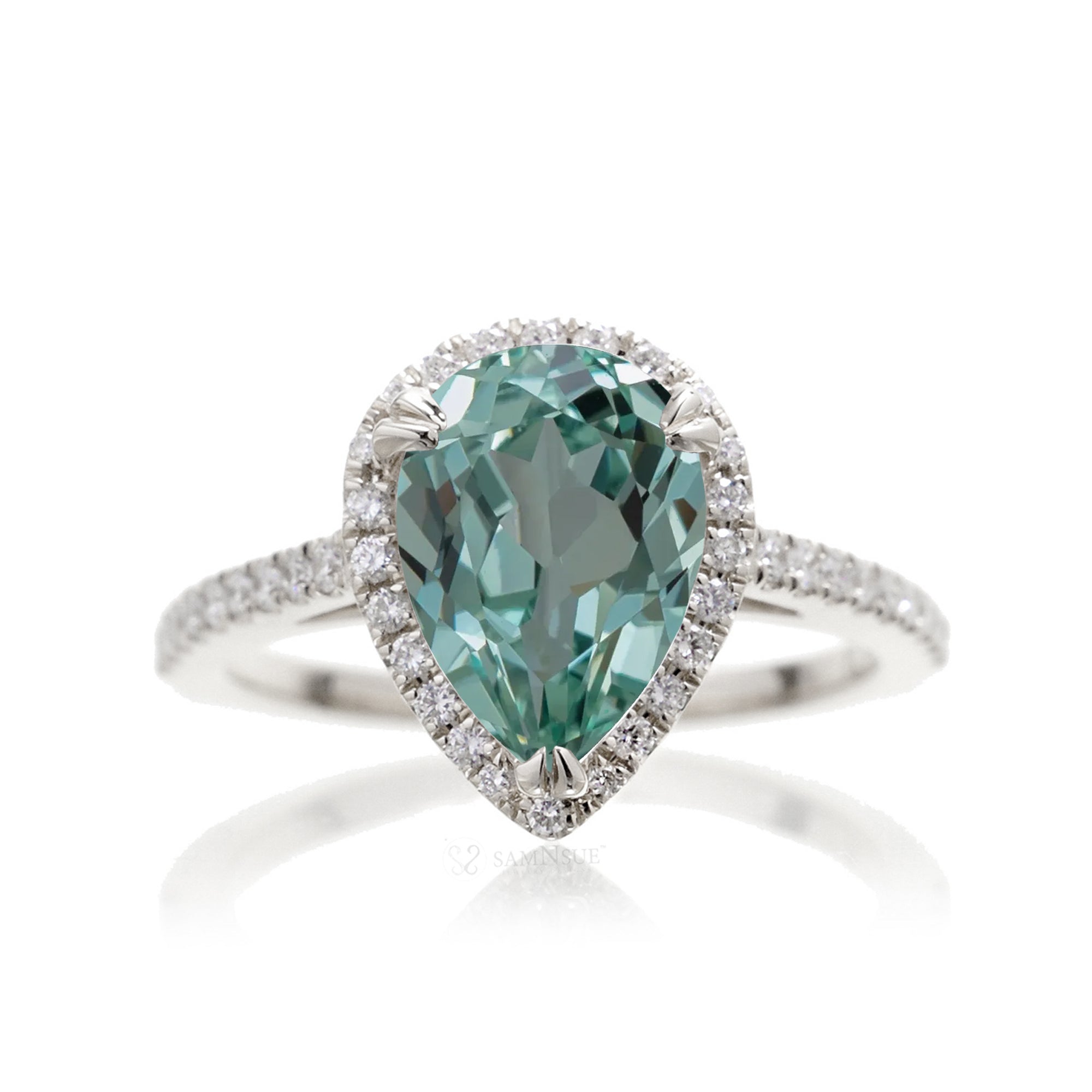 Pear shape green sapphire engagement ring