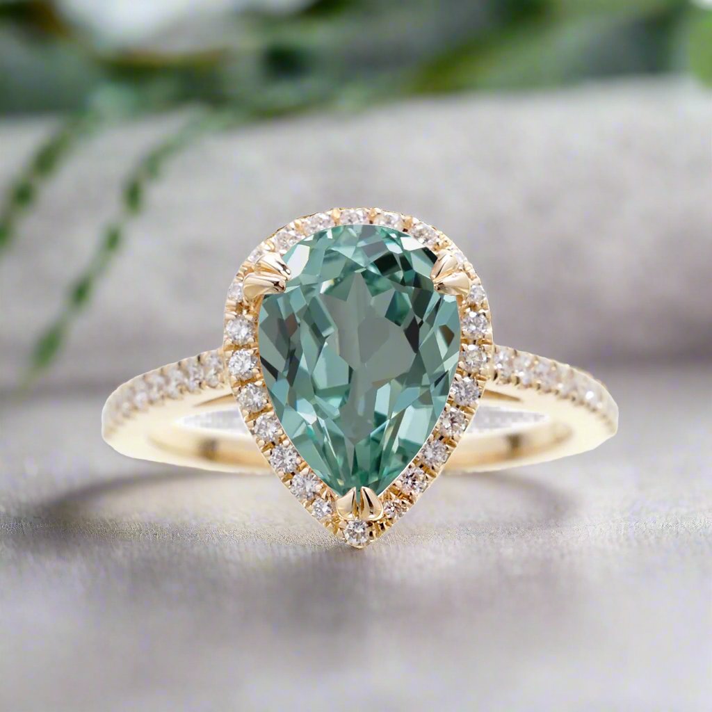 Pear Shape Green Sapphire Engagement Ring With Diamond Halo