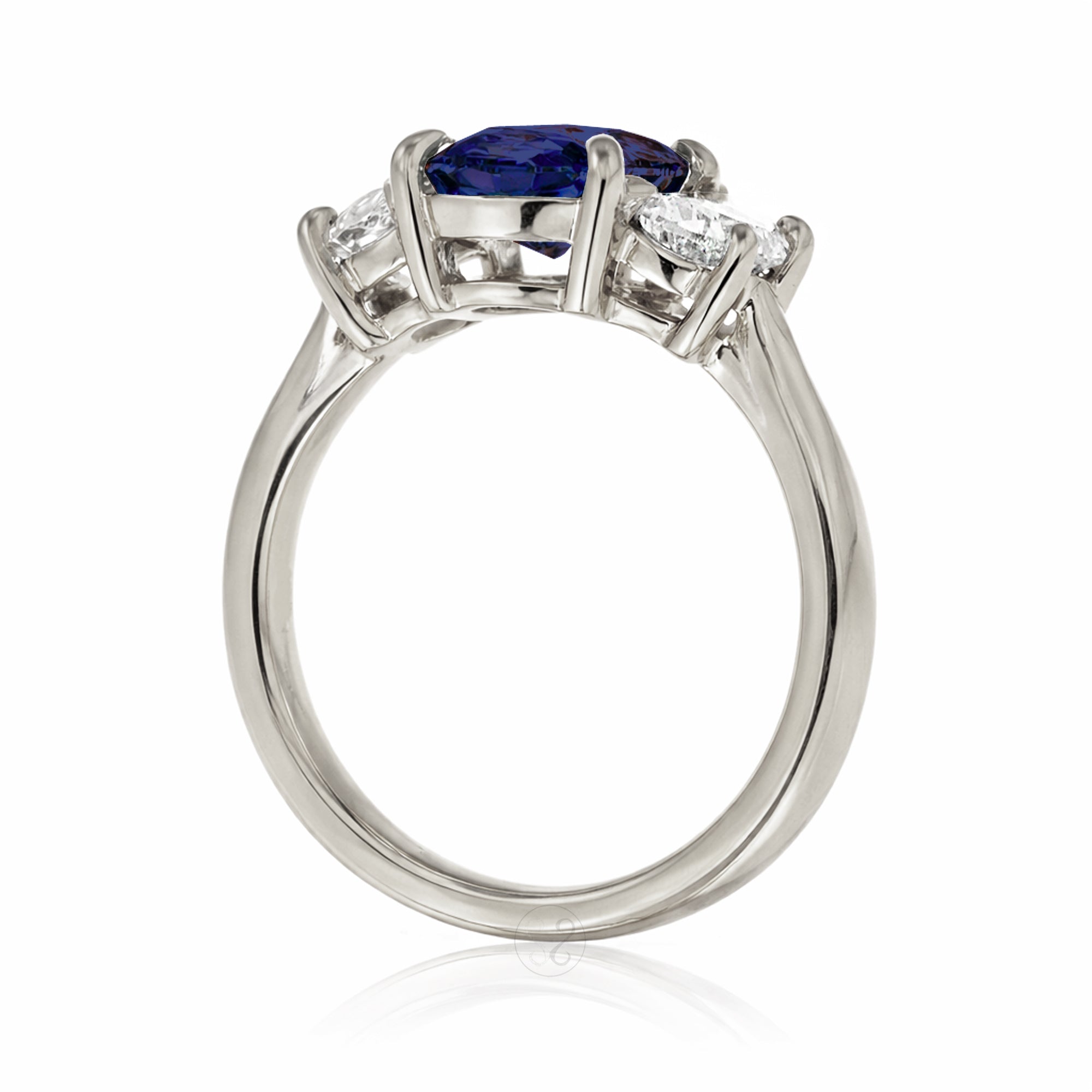 Oval blue sapphire half moon diamond three stone ring white gold