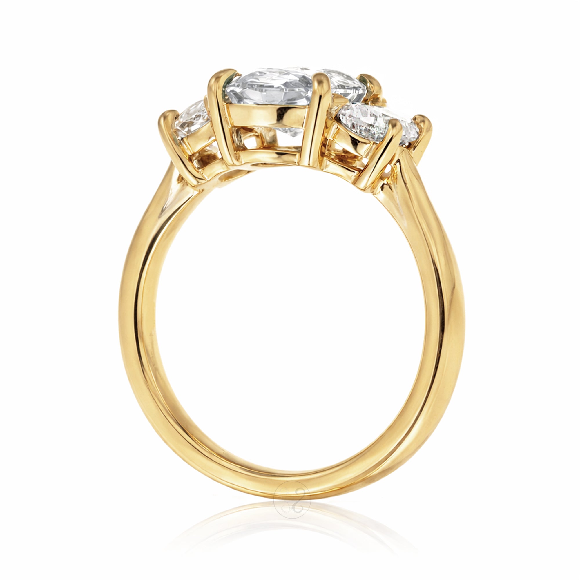 the-claire-three-stone-half-moon-oval-moissanite-ring-yellow-gold