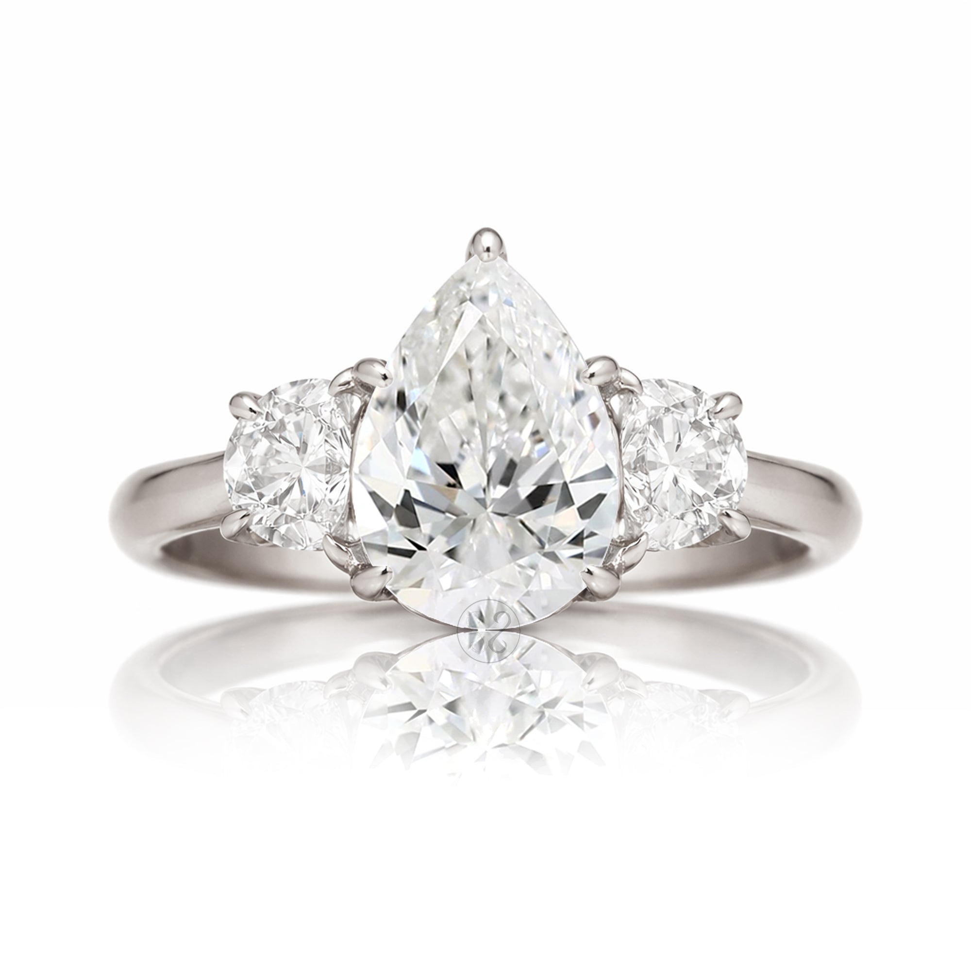 the-claire-three-stone-half-moon-pear-moissanite-ring-white-gold