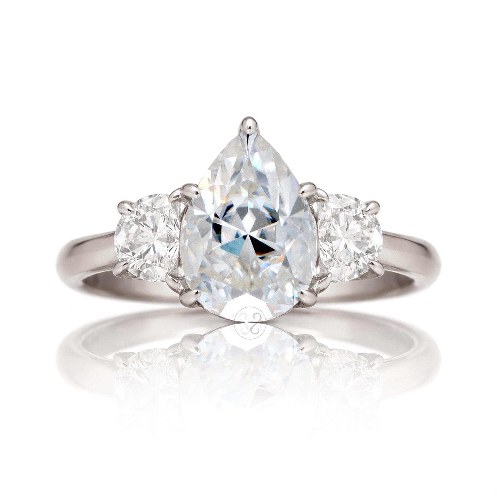 the-claire-three-stone-half-moon-pear-moissanite-ring-white-gold