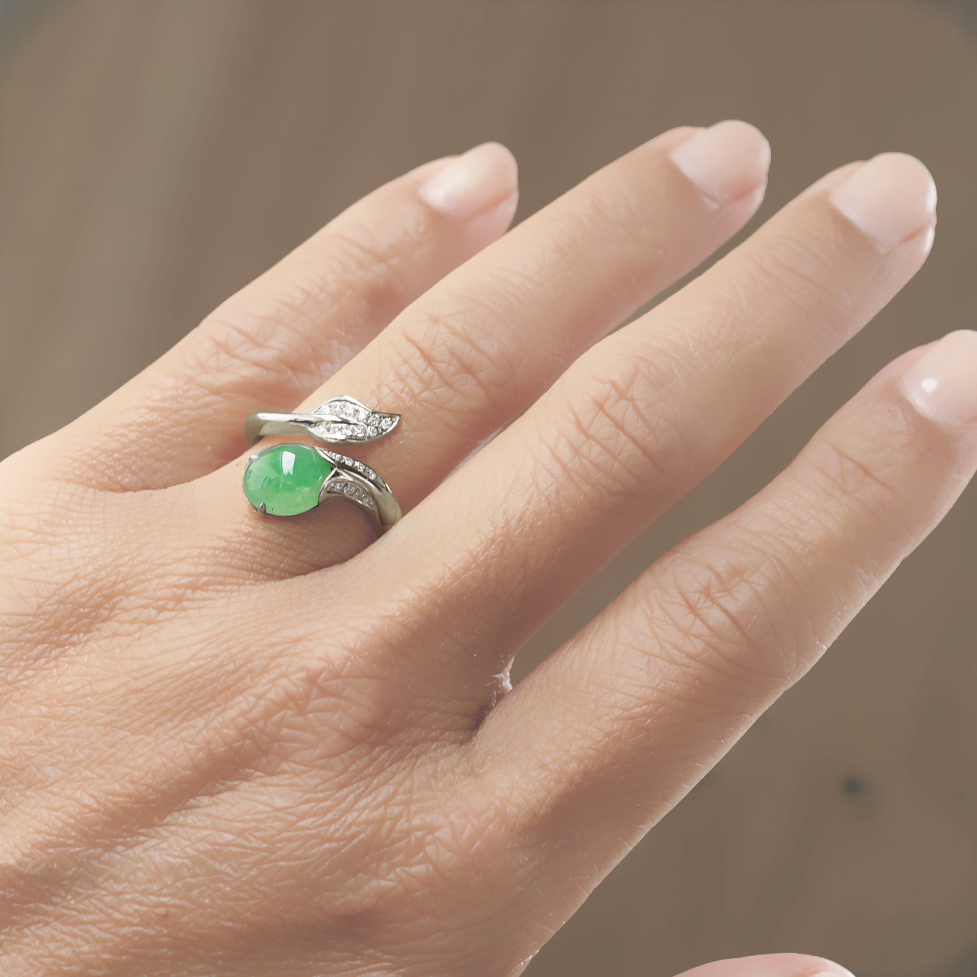Cabochon jade and diamond leaf open ring in white gold