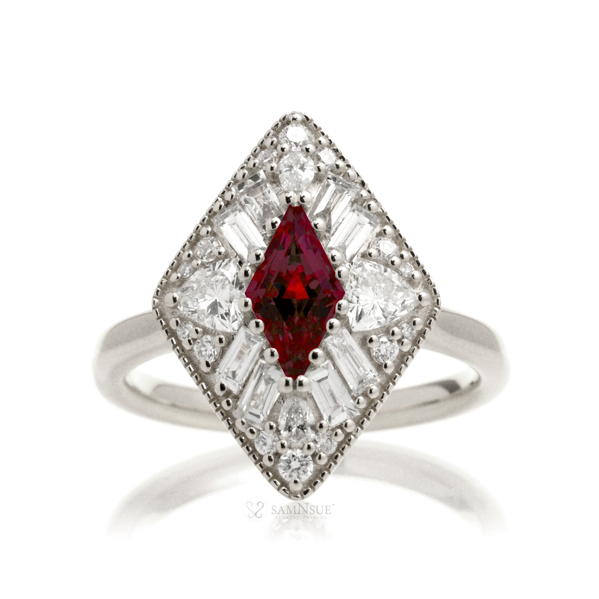 Kite cut ruby and diamond halo ring white gold vintage style