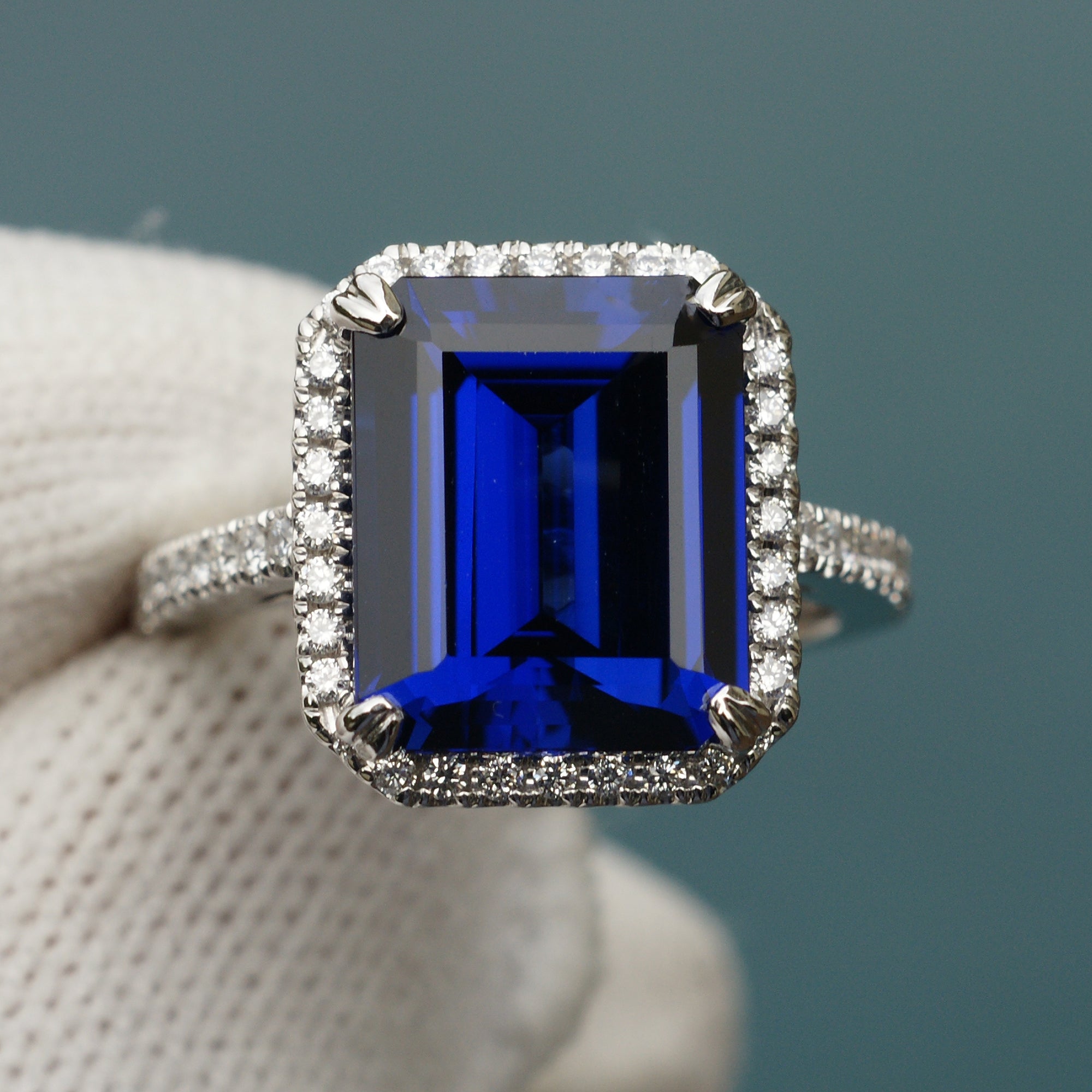 Blue sapphire emerald cut diamond halo and band wedding engagement ring set