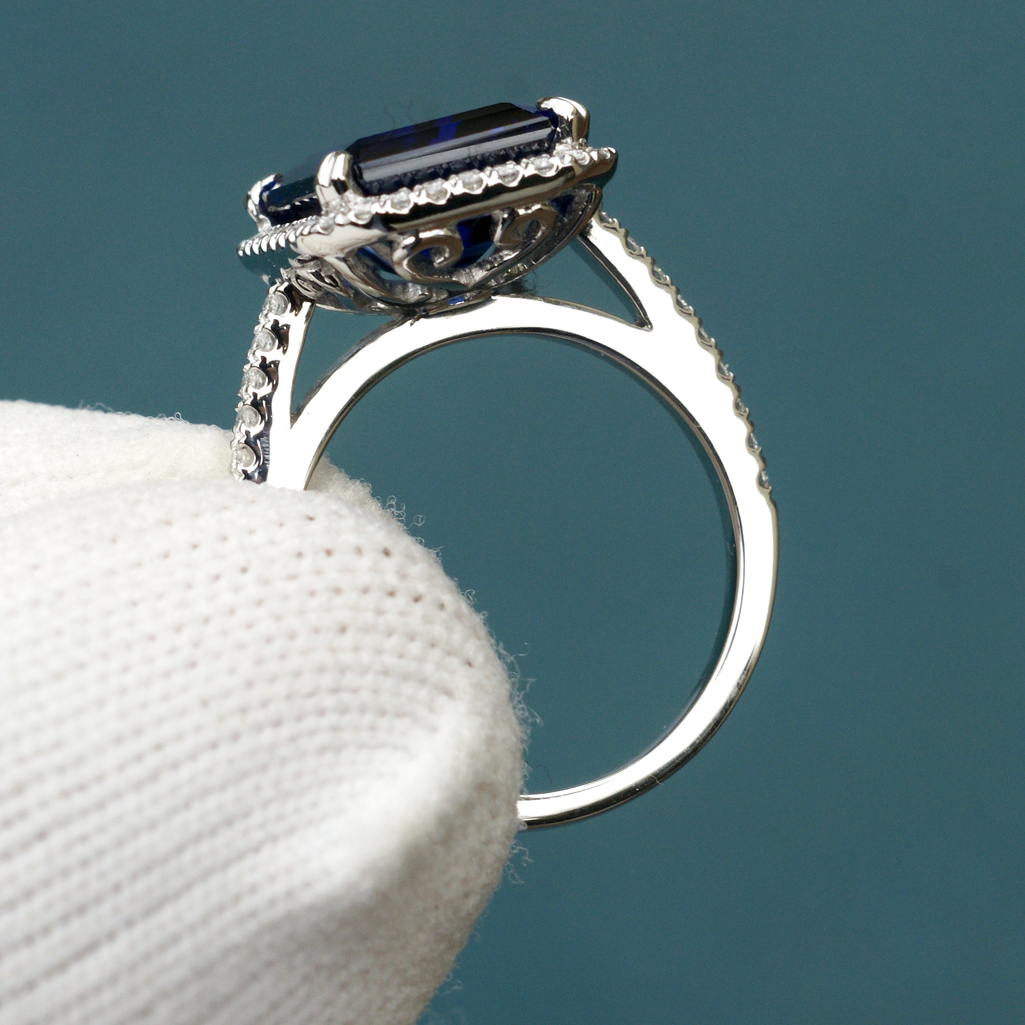Blue sapphire emerald cut diamond halo and band wedding engagement ring set