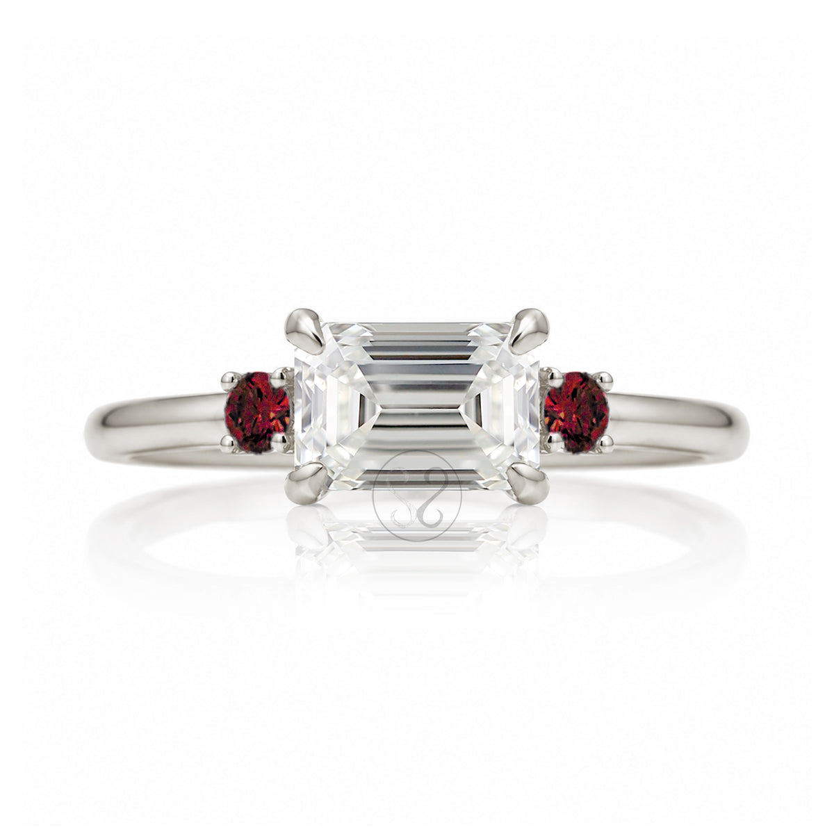 east-west emerald cut diamond three stone ring the Lena with side red rubies white gold