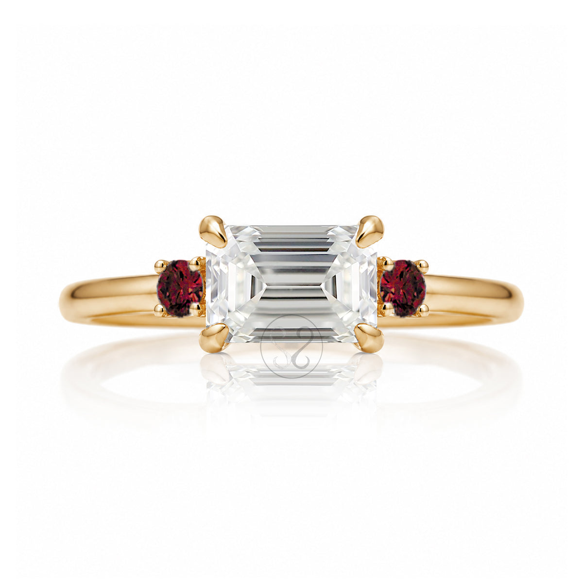east-west emerald cut diamond three stone ring the Lena with side red rubies yellow gold