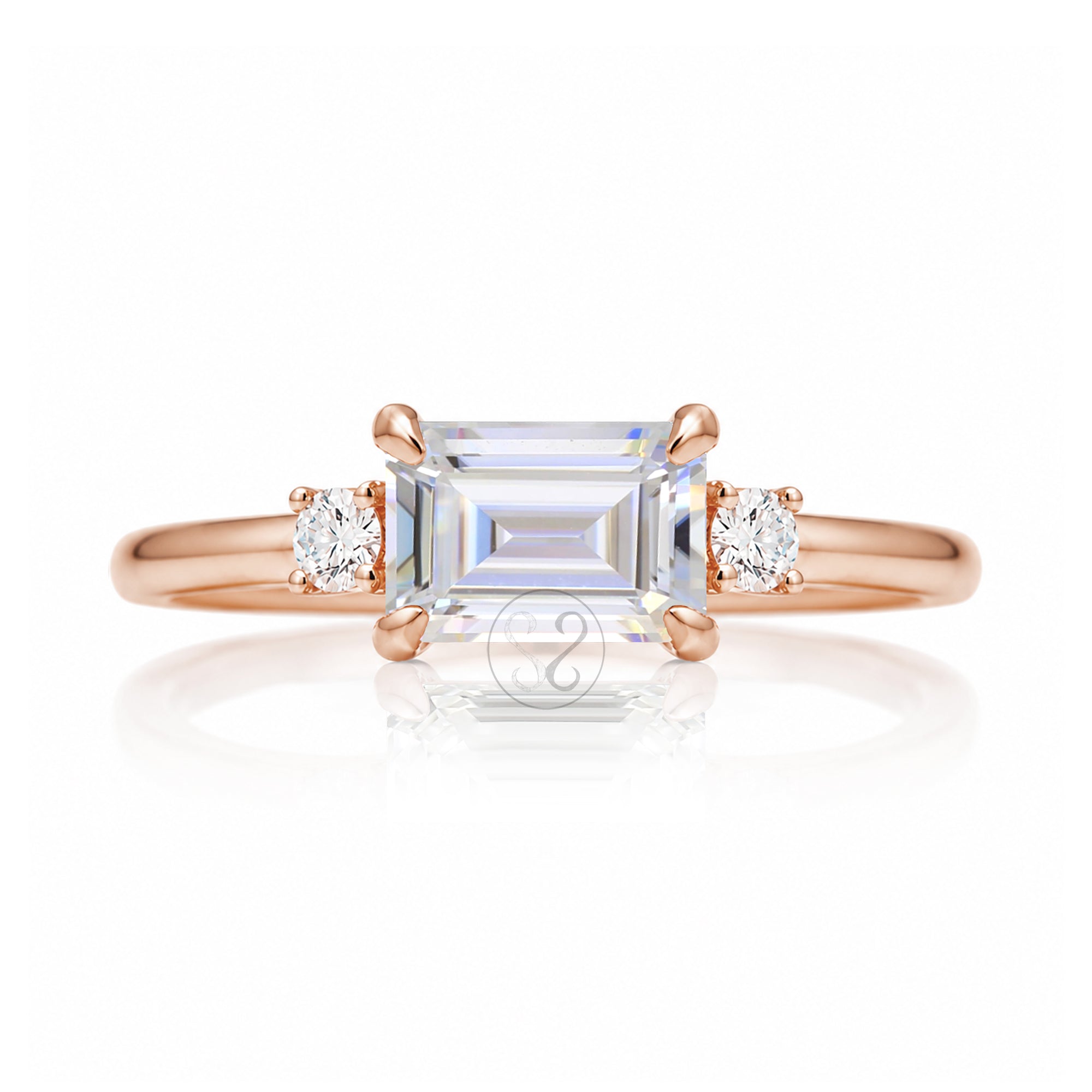 Emerald step cut moissanite three stone east-west ring the Lena rose gold