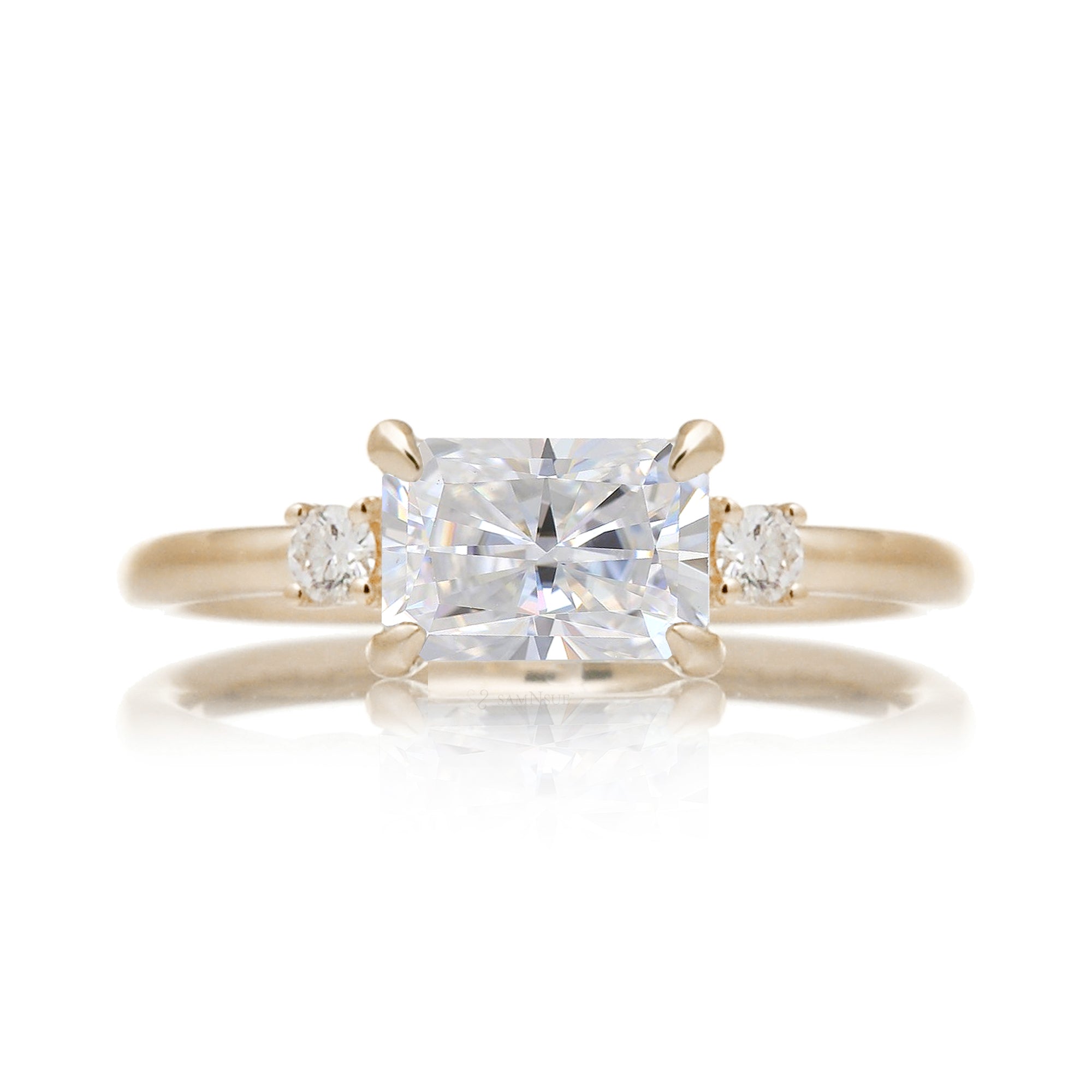 Radiant moissanite three stone east-west ring the Lena yellow gold