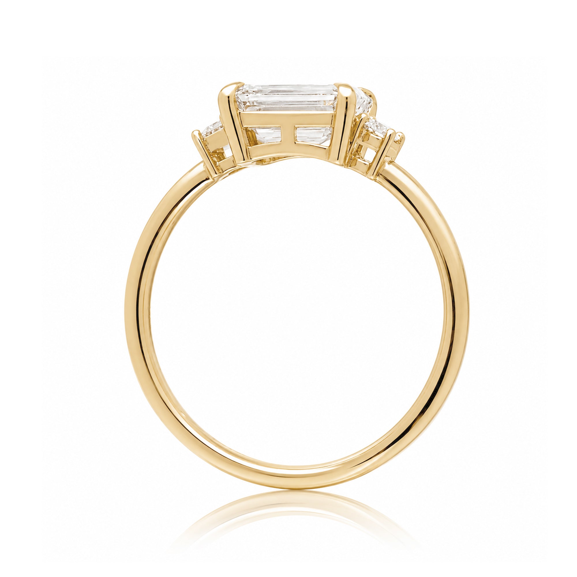 Radiant moissanite three stone east-west ring the Lena yellow gold