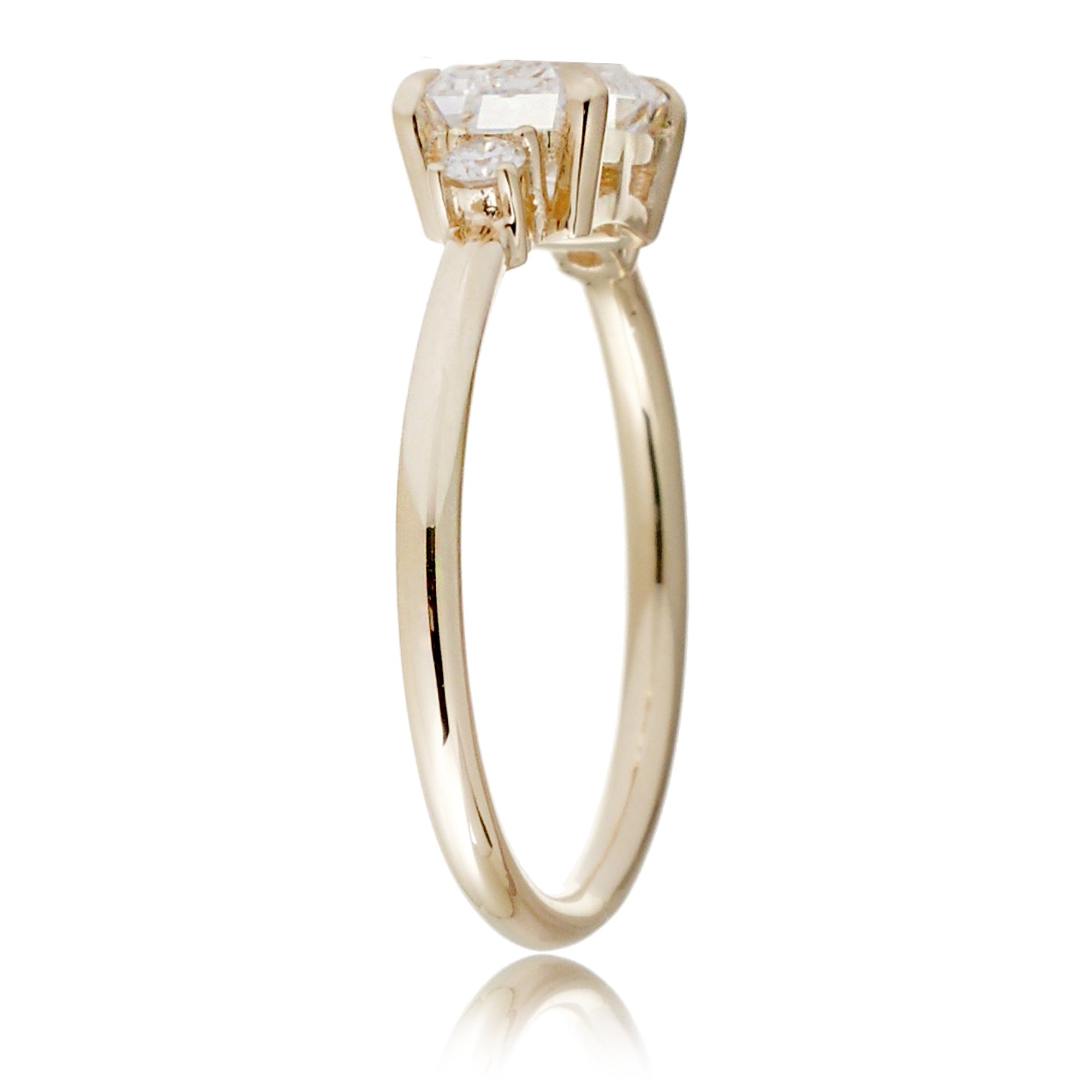 east-west emerald cut diamond three stone ring the Lena yellow gold