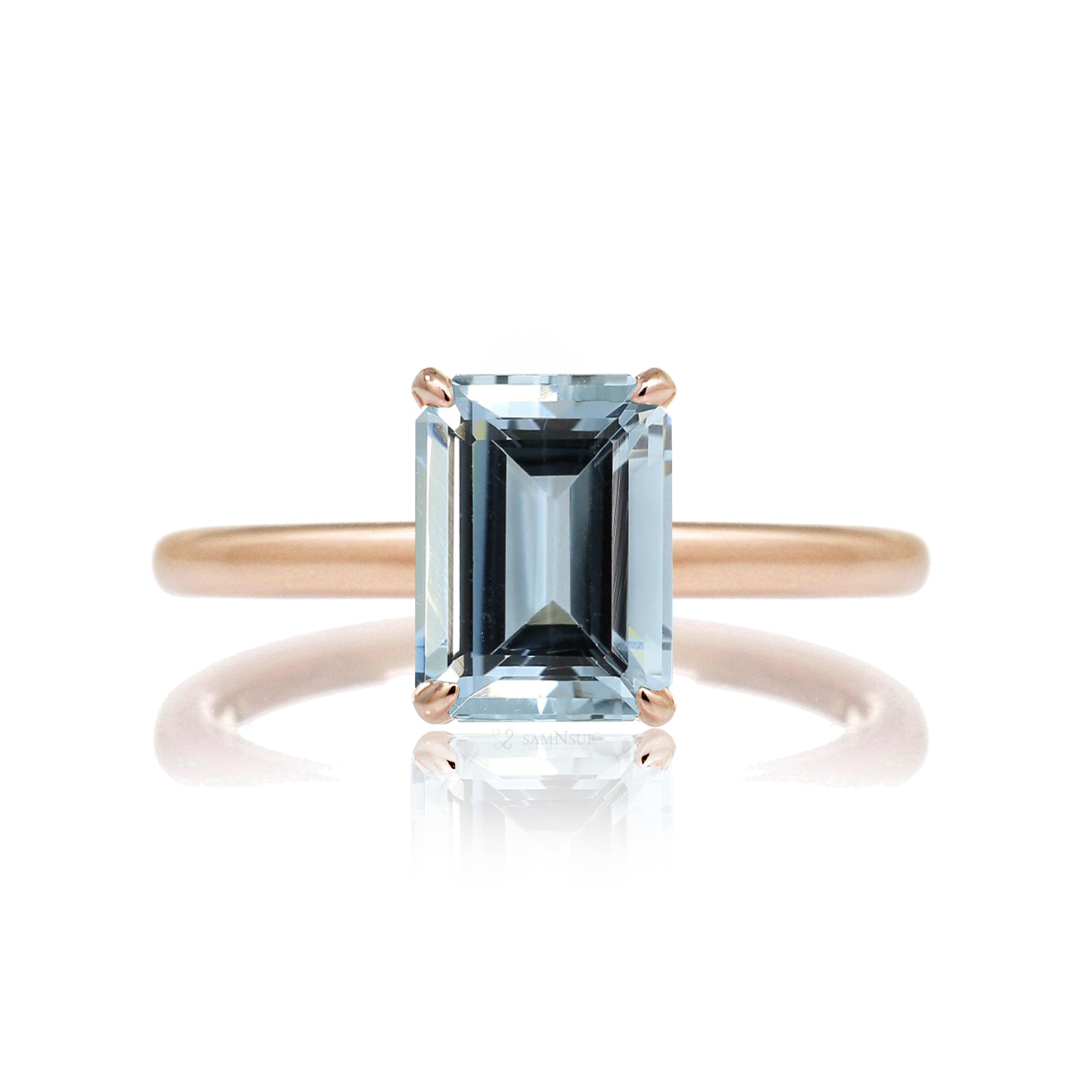 The Lucy Emerald Step Cut Aquamarine Ring