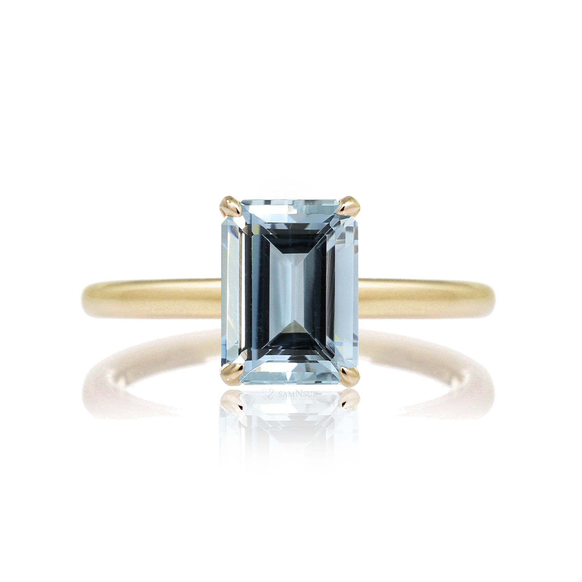 The Lucy Emerald Step Cut Aquamarine Ring