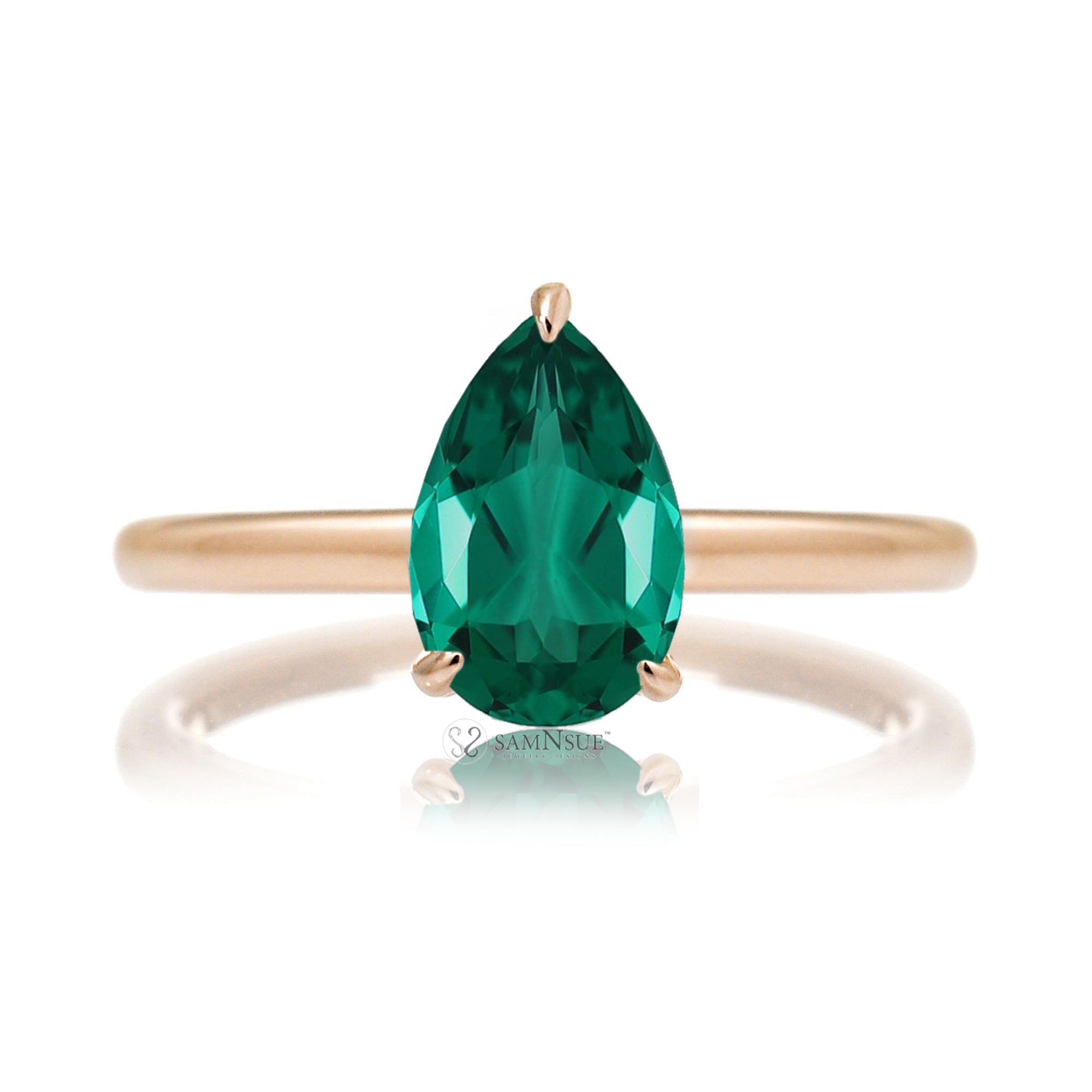 Pear cut green emerald ring with diamond hidden halo on rose gold