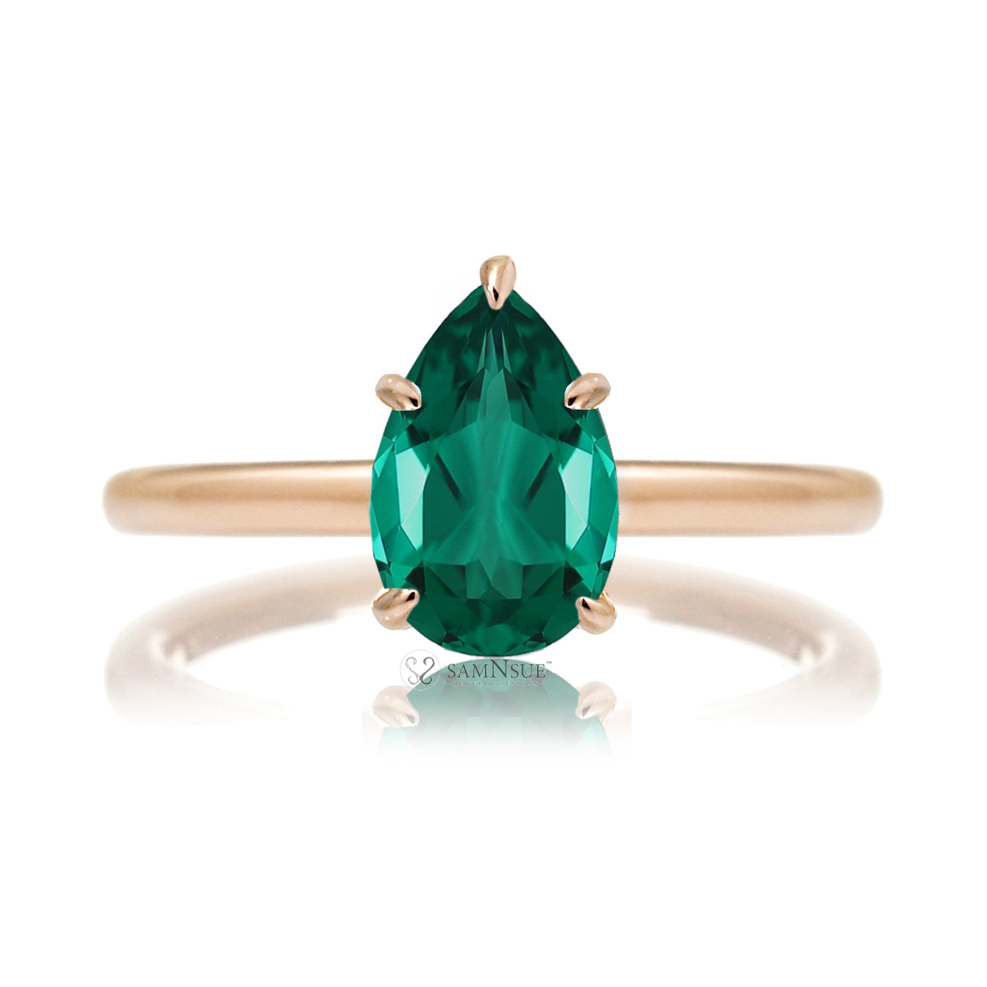 Pear cut green emerald ring with diamond hidden halo on rose gold