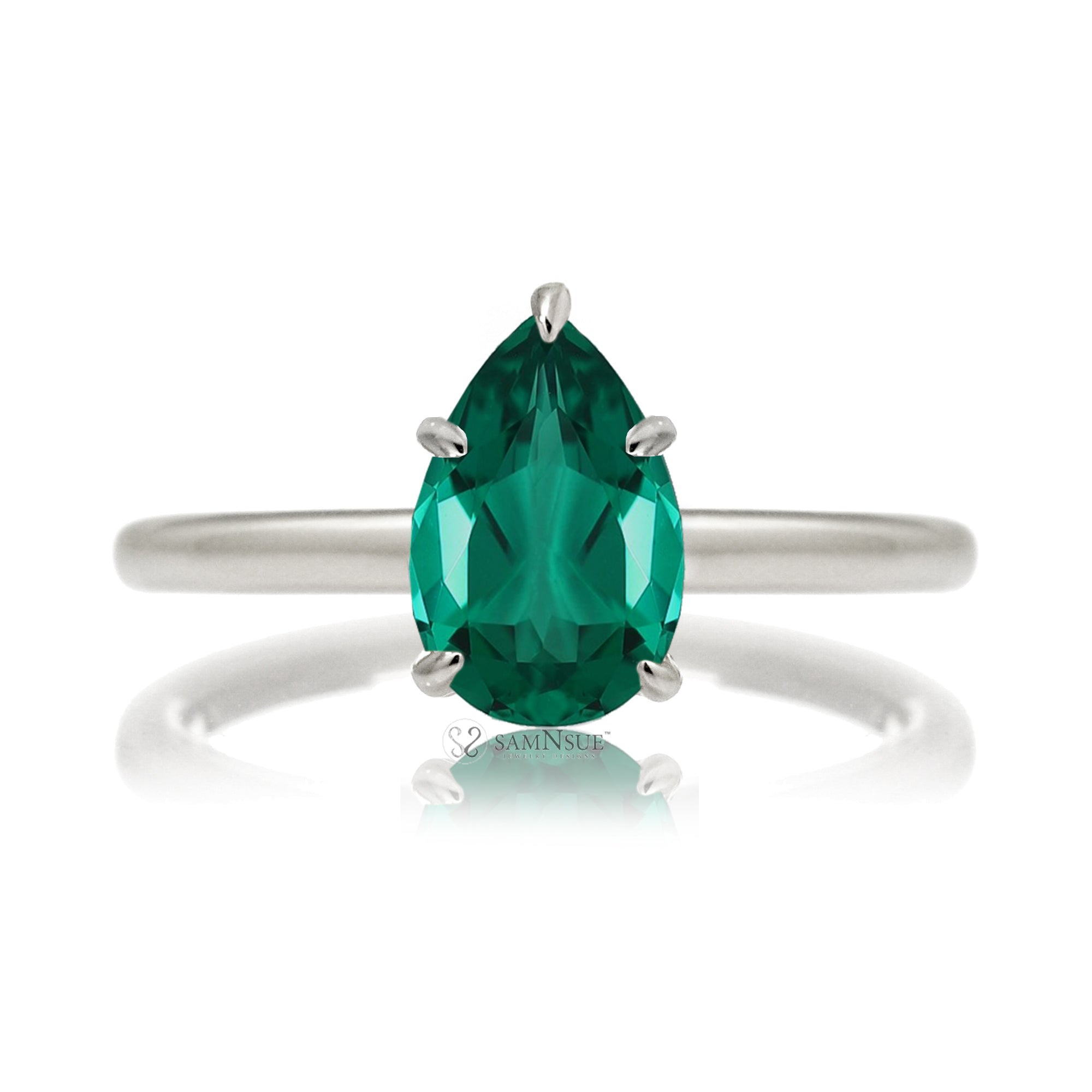 Pear cut green emerald ring with diamond hidden halo on white gold