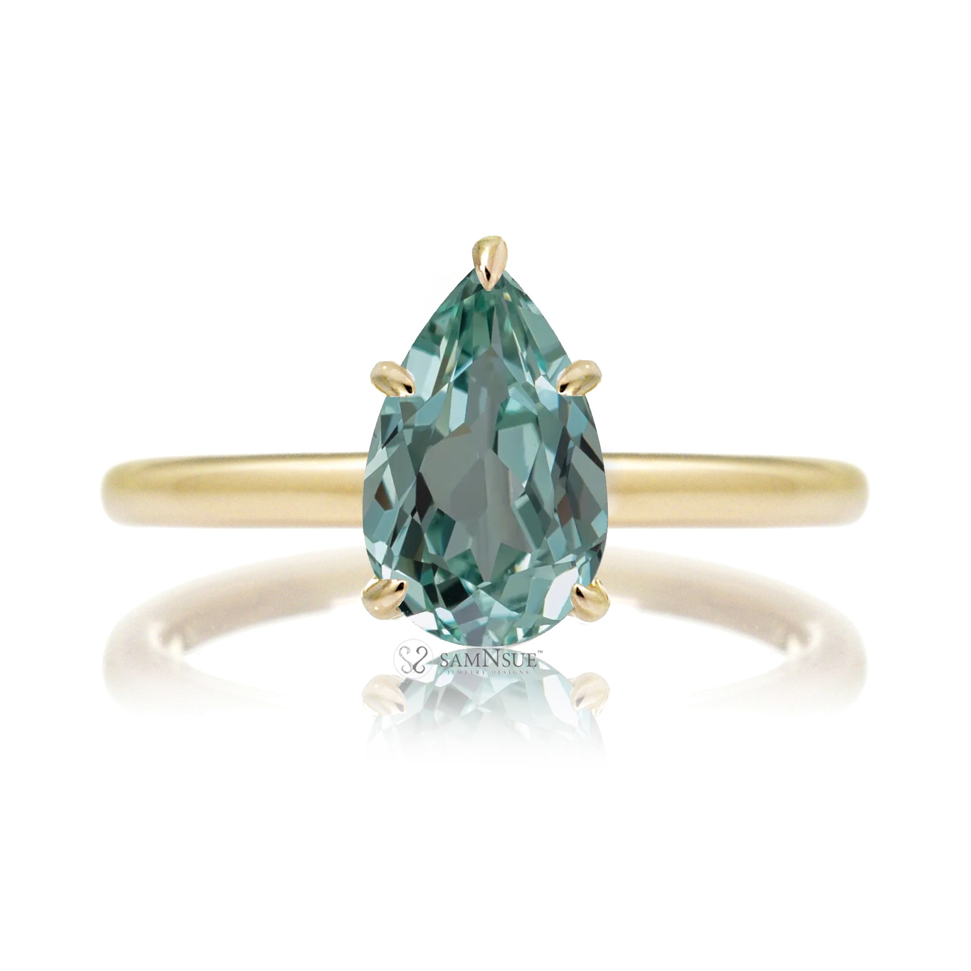 Pear green sapphire solitaire engagement ring in yellow gold