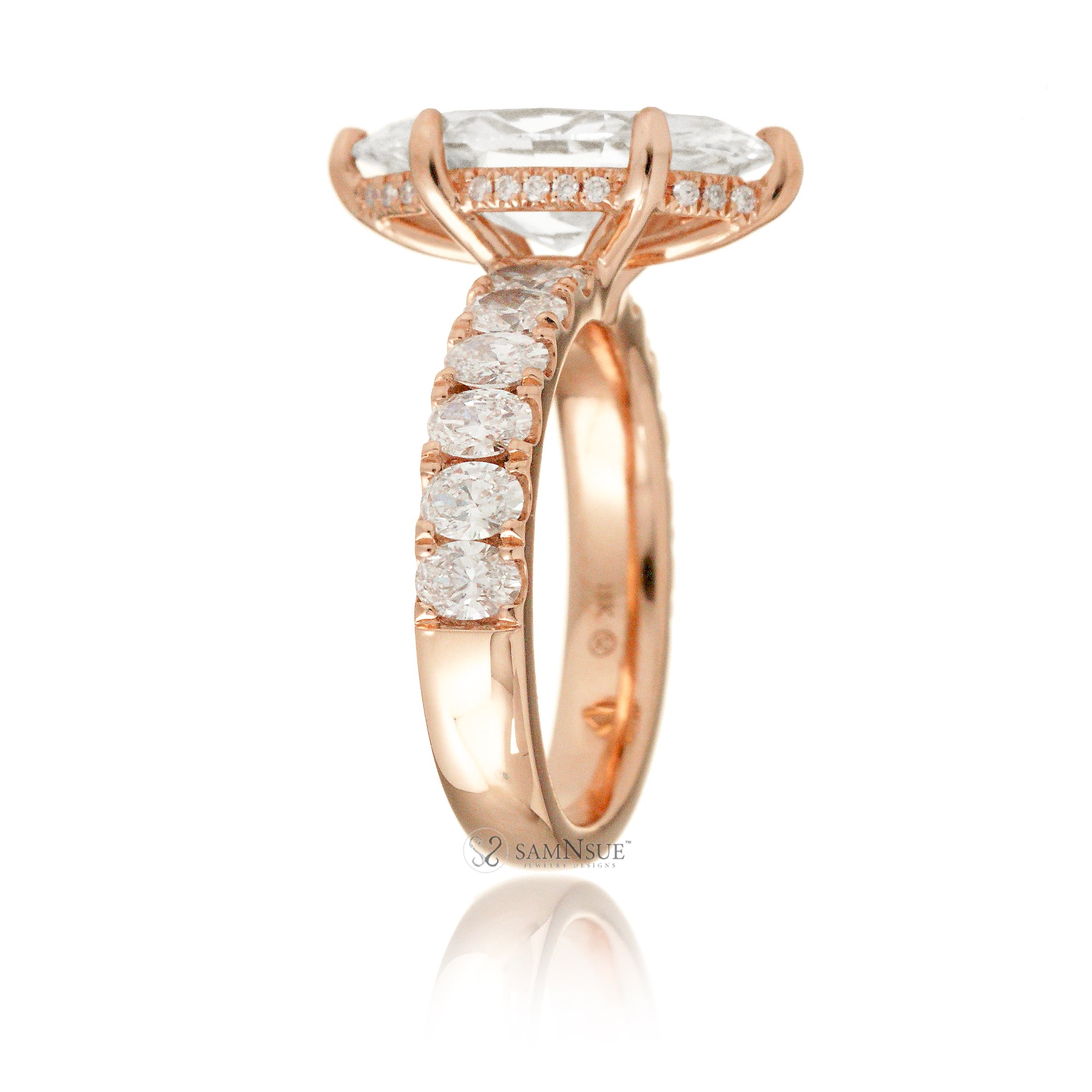 Large marquise cut diamond ring with wide oval diamond band and hidden diamond halo rose gold