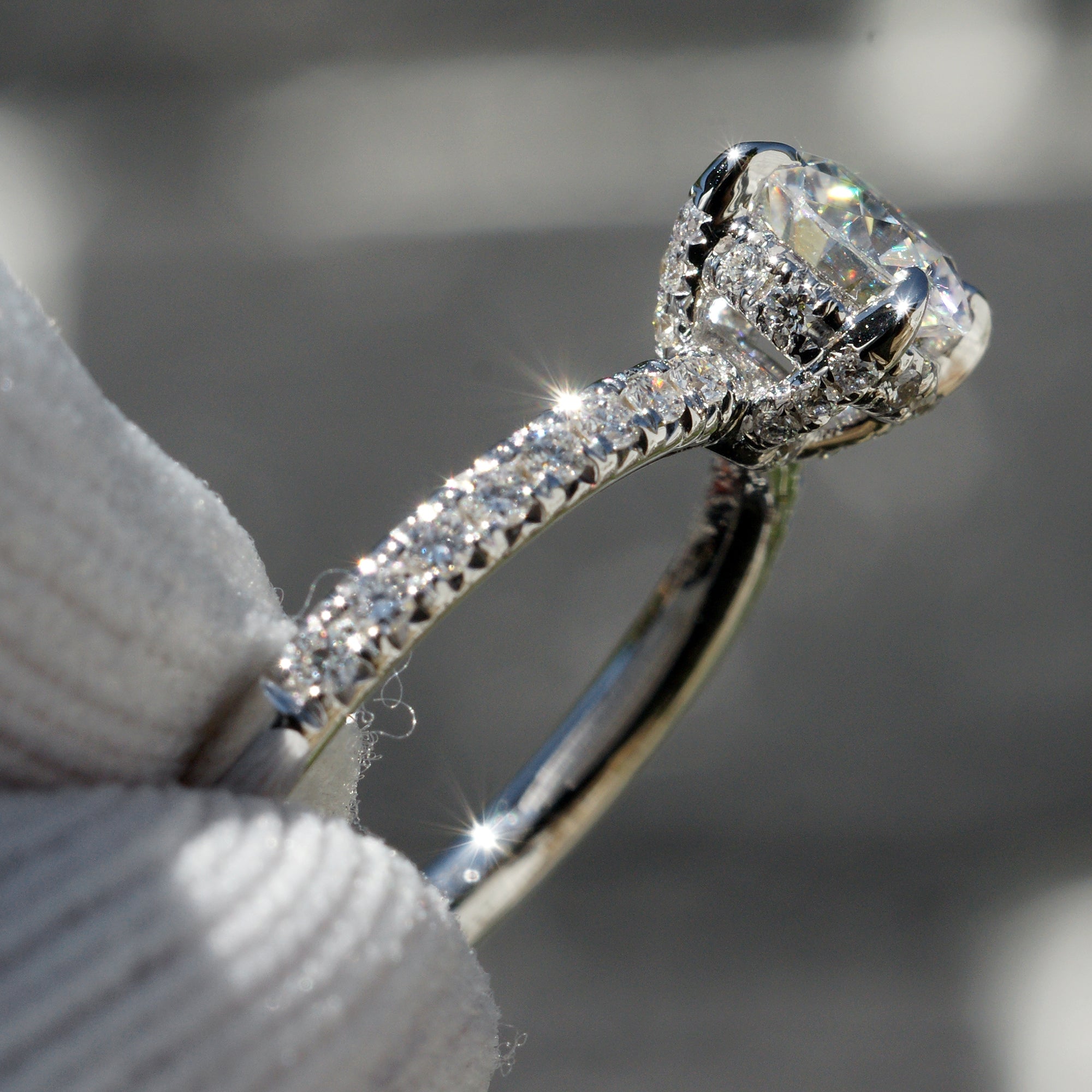 The Drenched Solitaire Round Moissanite Ring 6mm 18k white gold