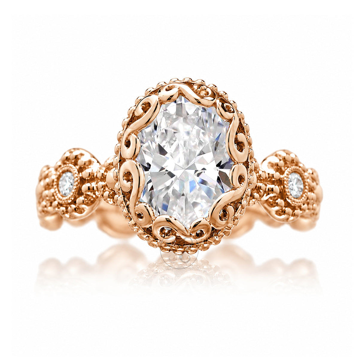 An ornate rose gold filigree ring featuring a large oval-cut clear center stone and two small round accent stones on the shoulders, shown on a clean white background with a soft reflection.