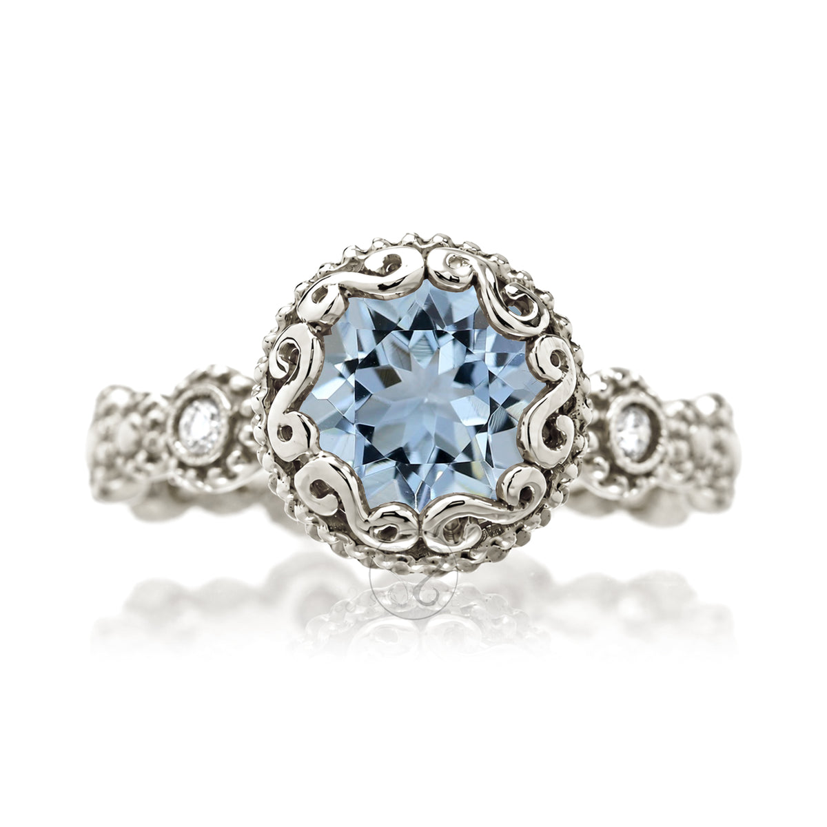 Round aquamarine bezel ornate center stone with vintage style eternity band white gold