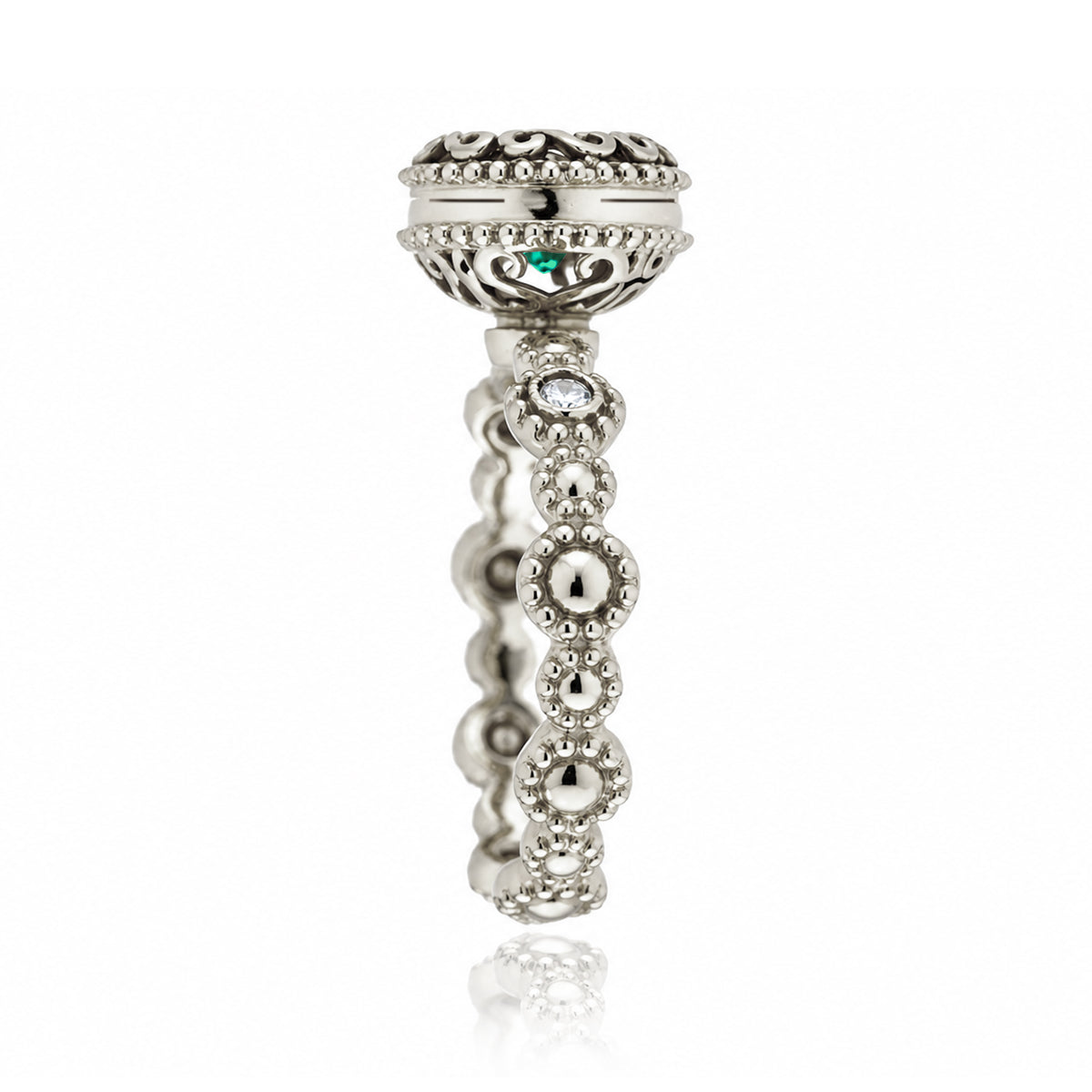 The Nilda Round Emerald Ring