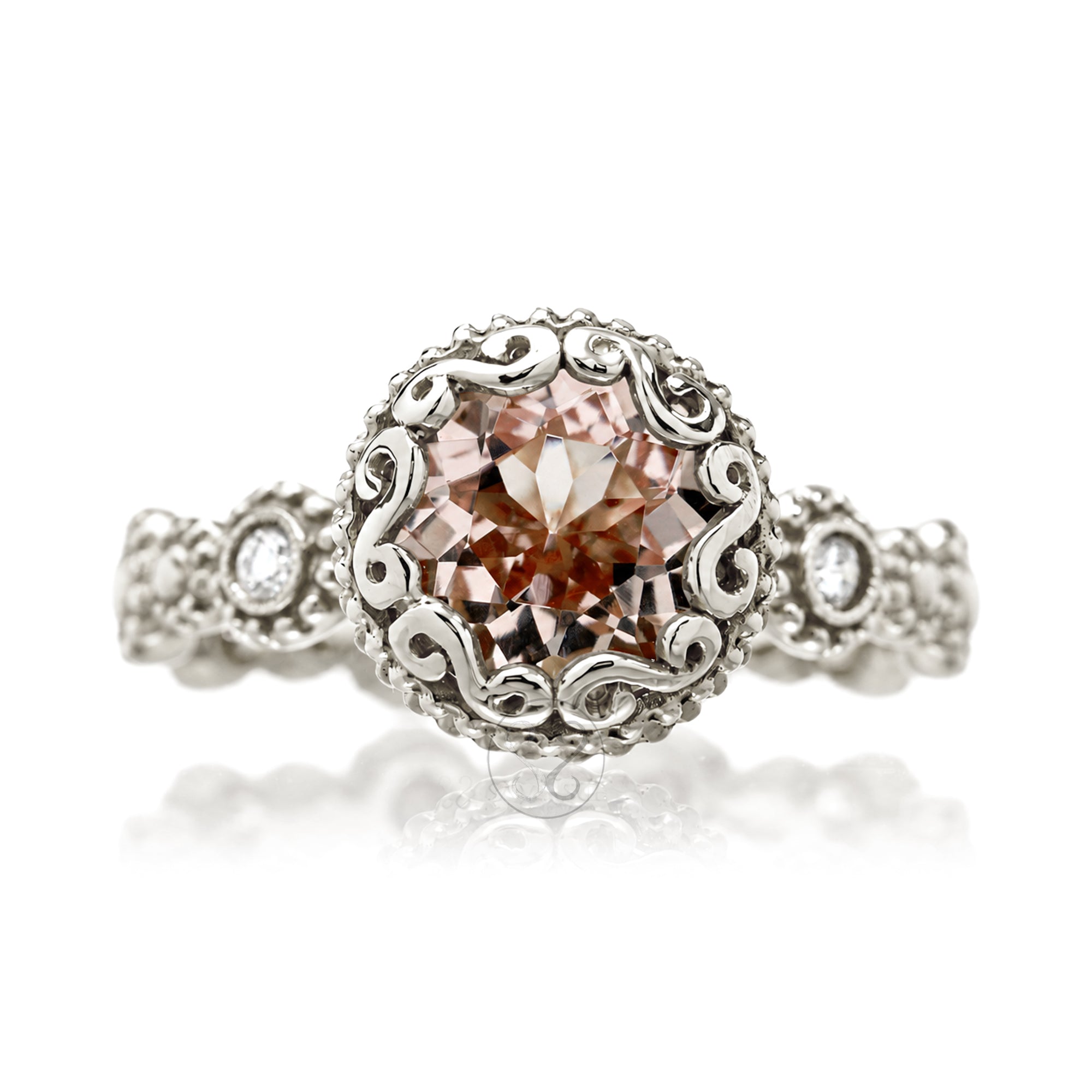 An ornate rose gold ring featuring a large round-cut brown gemstone in a detailed filigree setting, with small accent diamonds on the shoulders, incased bezel style center stone white gold