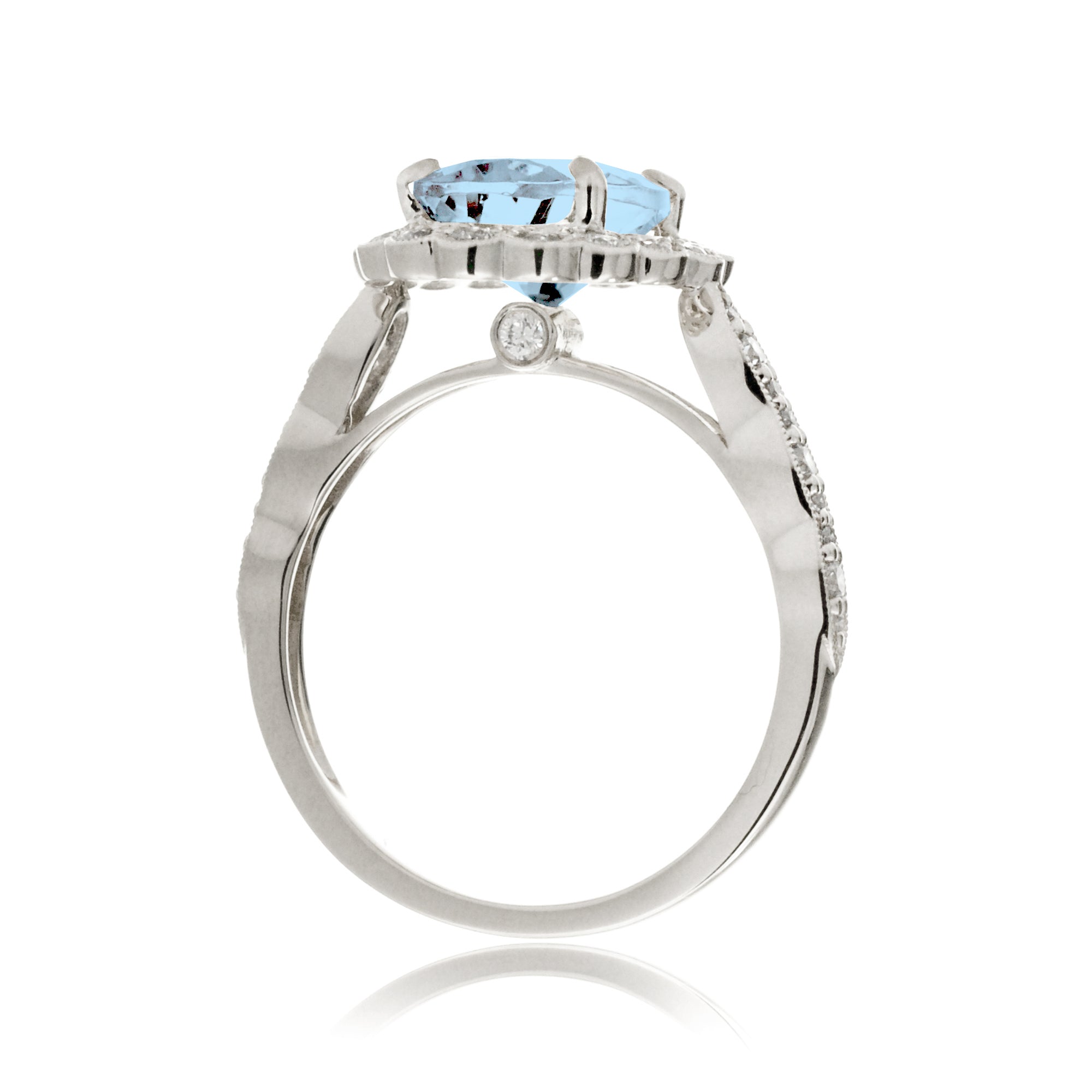 Oval aquamarine ring with diamond scallop halo and vintage diamond band in white gold