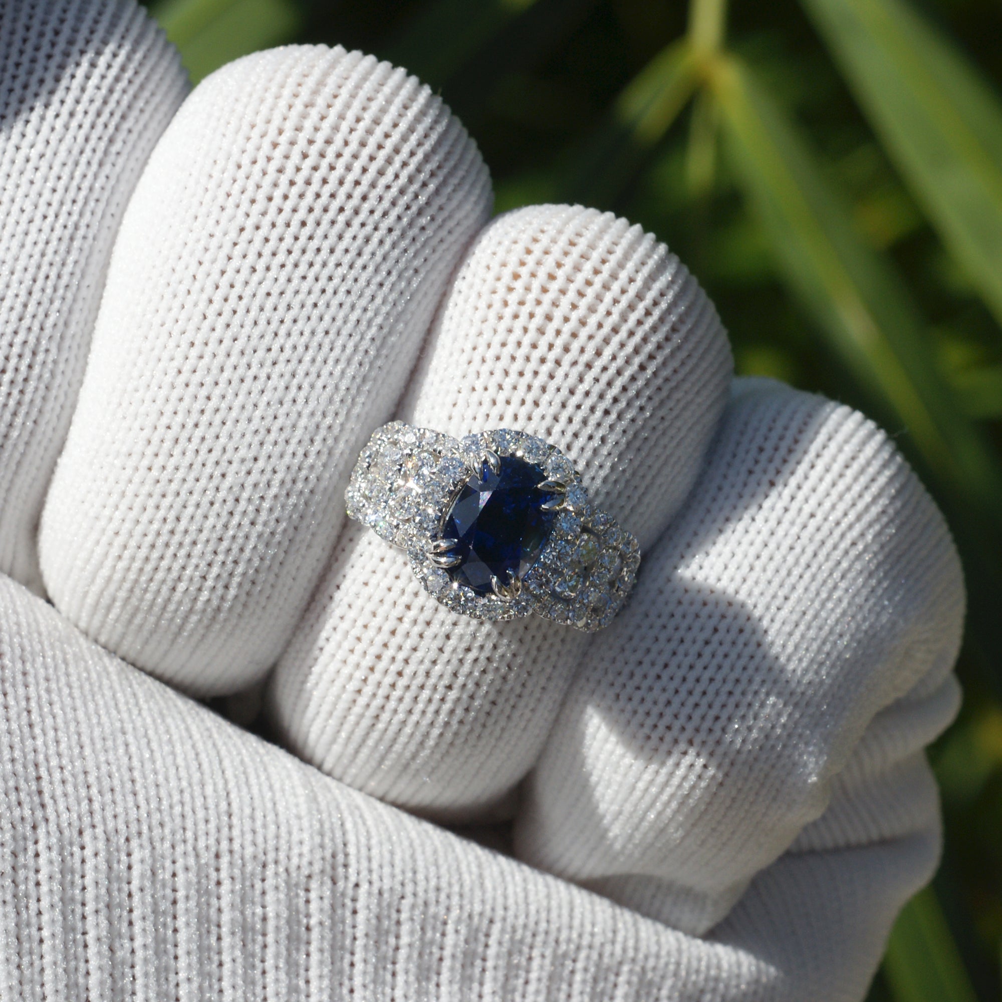 Natural sapphire and diamond ring with halo and wide band in white gold