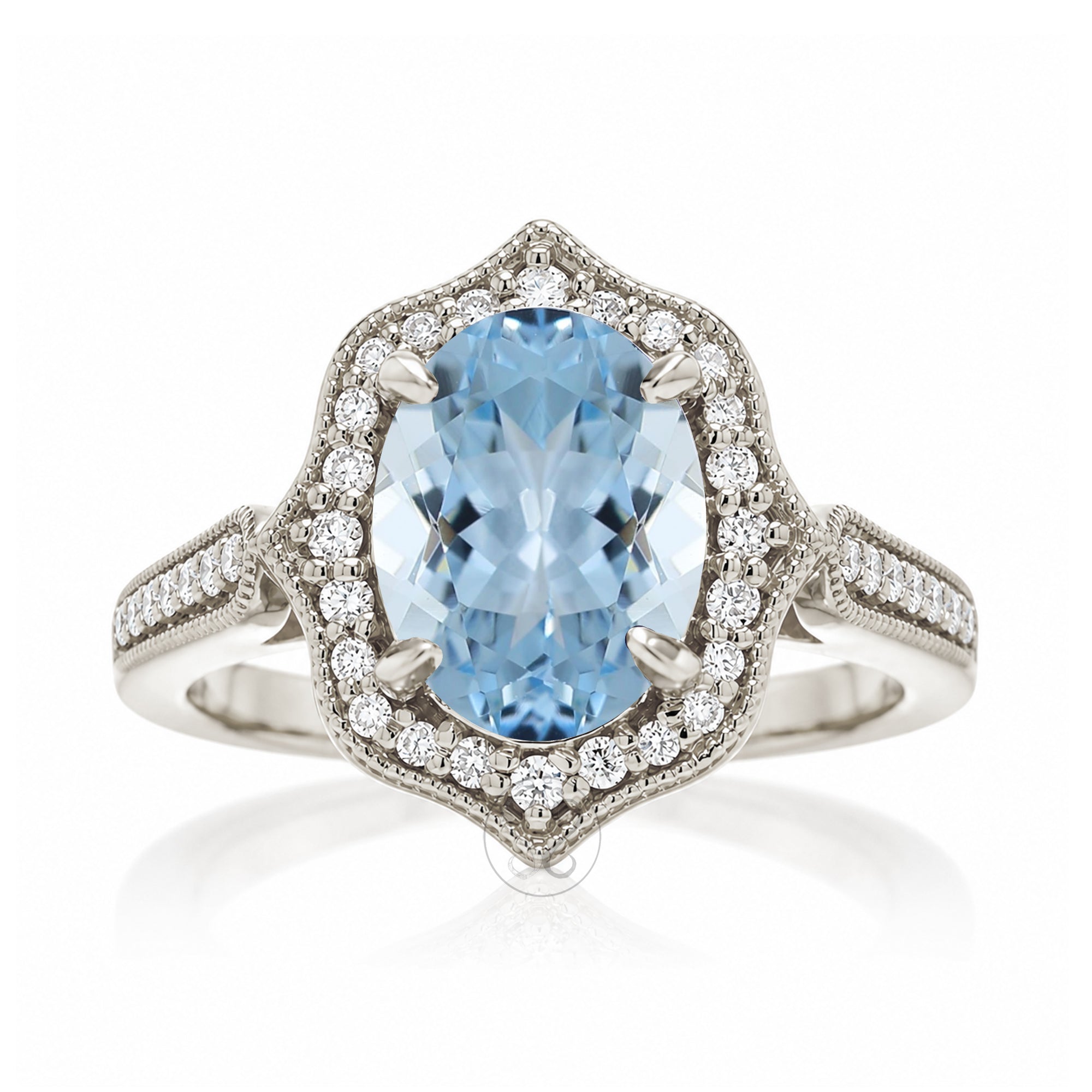 Elegant Oval Aquamarine and Diamond Ring in White Gold