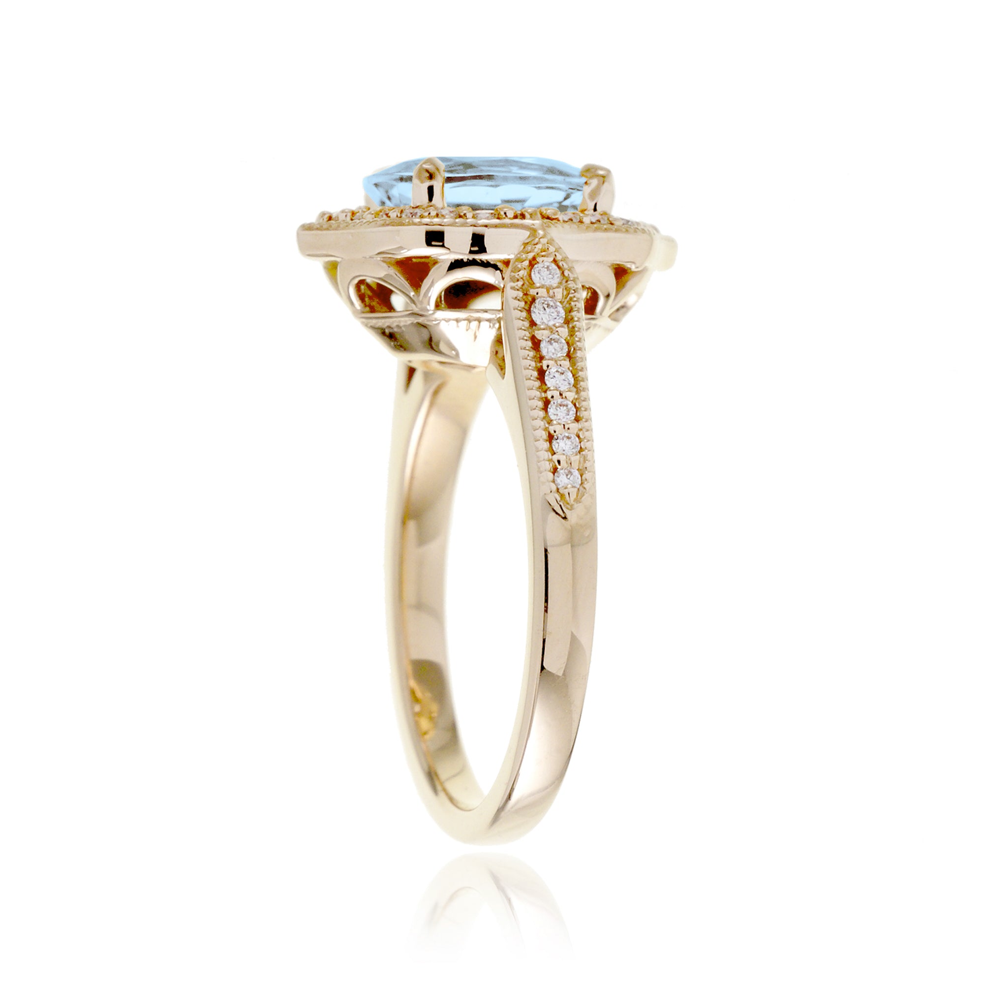 Vintage Oval Aquamarine and Diamond Halo Ring in Yellow Gold