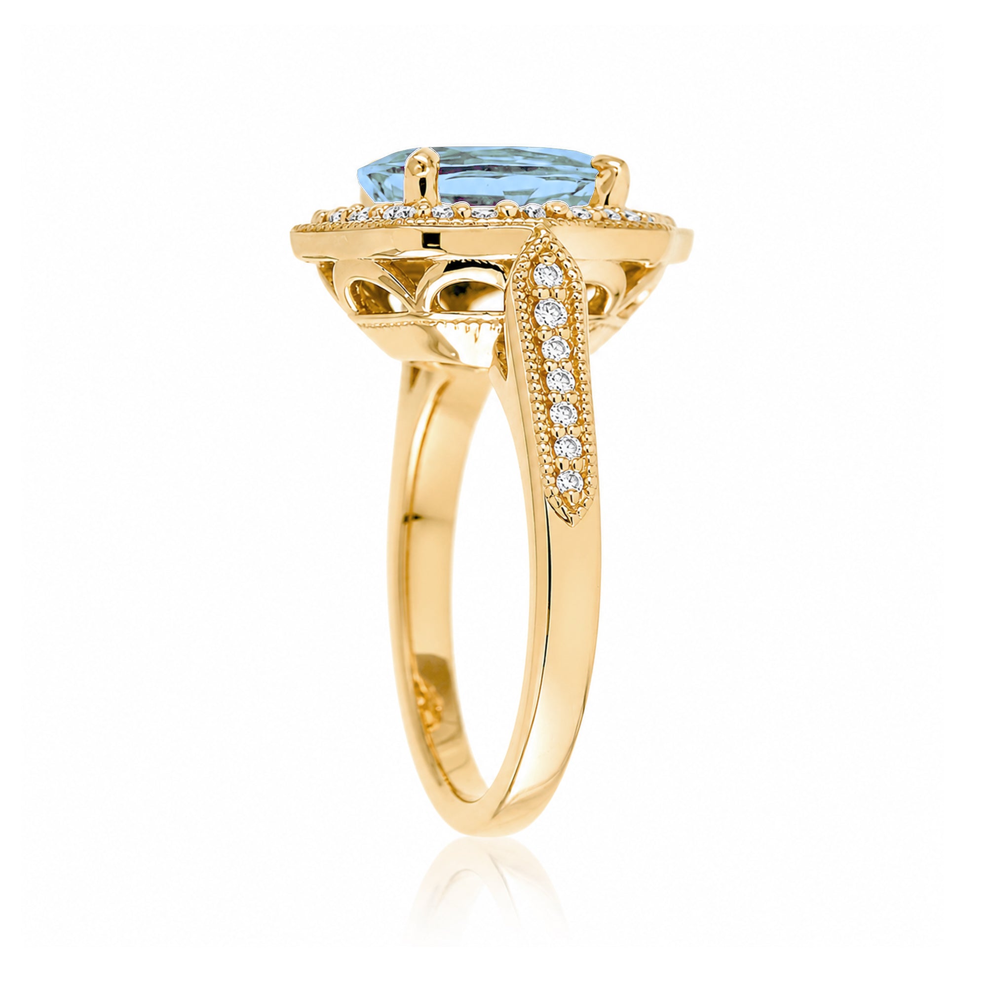 Vintage Oval Aquamarine and Diamond Halo Ring in Yellow Gold