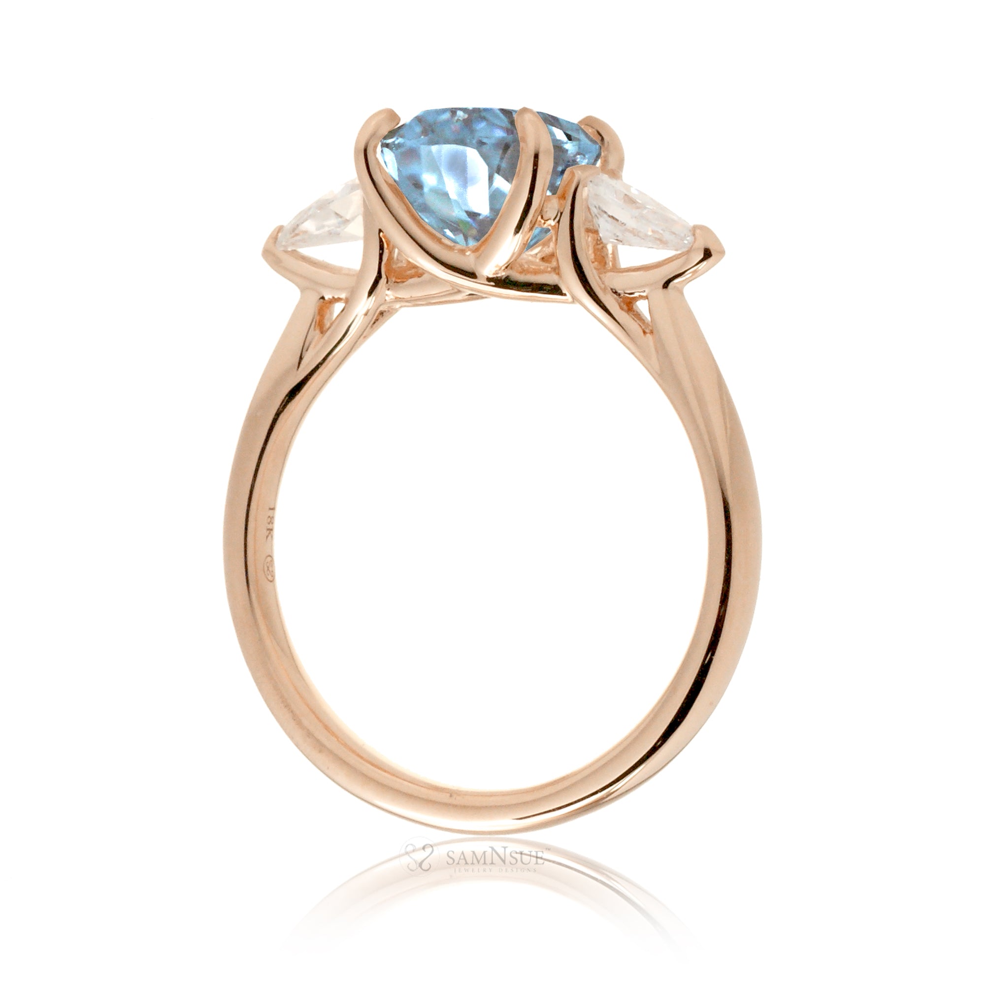 Oval aquamarine proposal ring with pear side diamonds rose gold