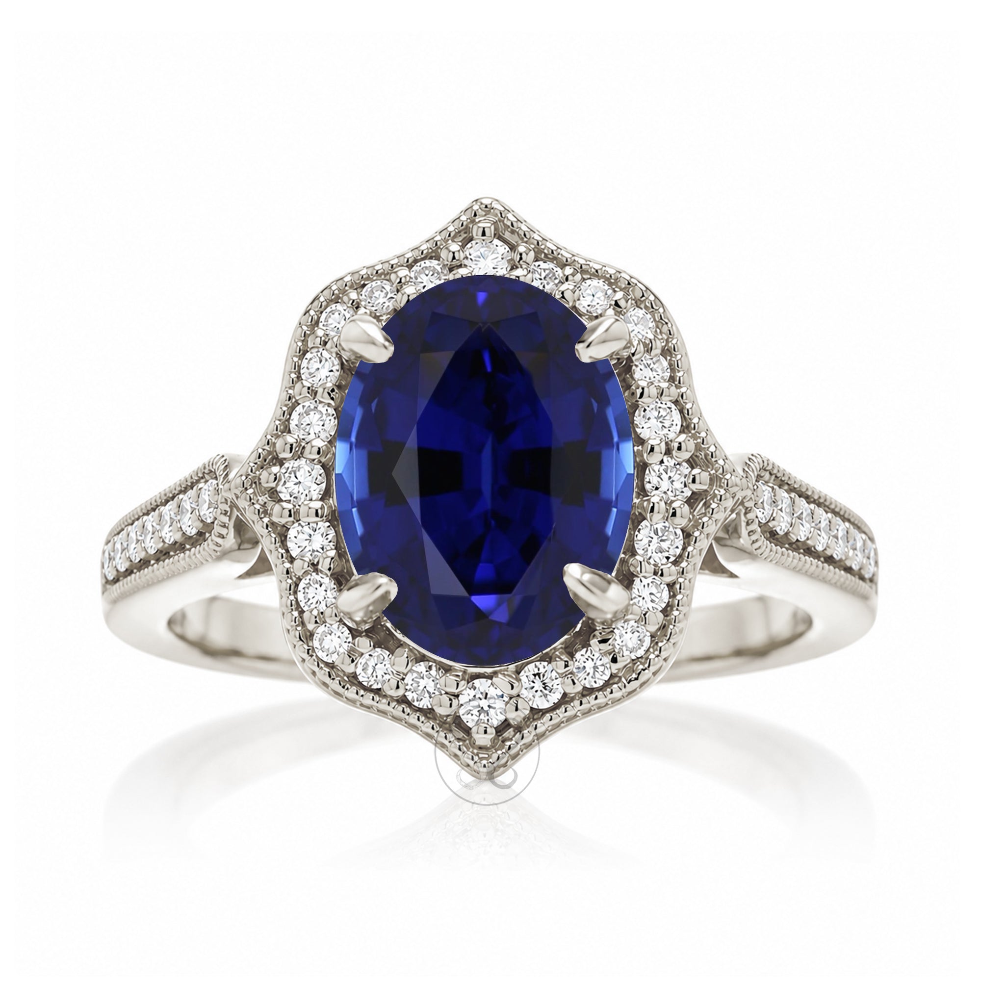 Elegant Oval Blue Sapphire and Diamond Ring in White Gold